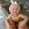 Quincey joined the competition — help win amazing prizes! toddler, child, smile, blonde_hair, yellow_dress, bow, necklace, wicker_chair, outdoor, porch, person, legs, hand, happy, cute, summer, casual, sitting, face, skin