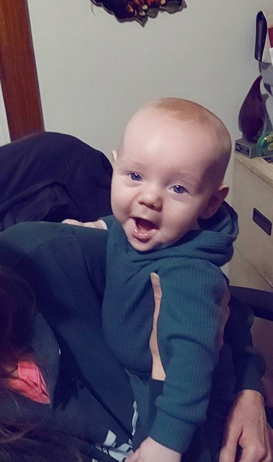 Bentley is registered to the contest to win money with this photo: baby, baby_toddler_clothing, cheek, child, cloud, comfort, electric_blue, eyebrow, fun, happy, head, iris, mouth, person, purple, sitting, skin, sleeve, smile, t_shirt