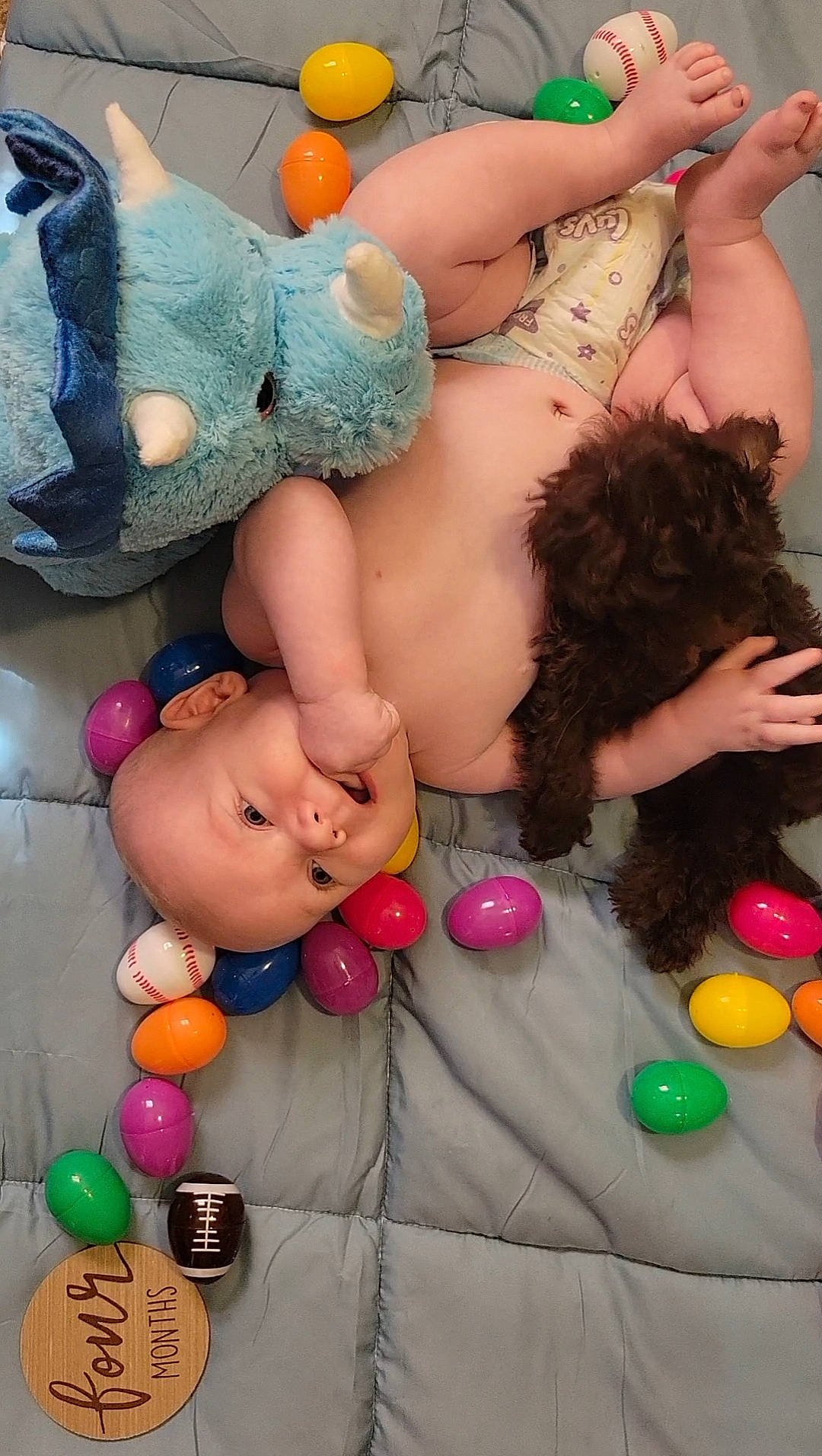 Bentley is registered to the contest to win money with this photo: abdomen, balloon, chest, child, event, fun, leisure, mammal, navel, party, party_supply, person, pink, play, stuffed_toy, teddy_bear, textile, thigh, toy, trunk