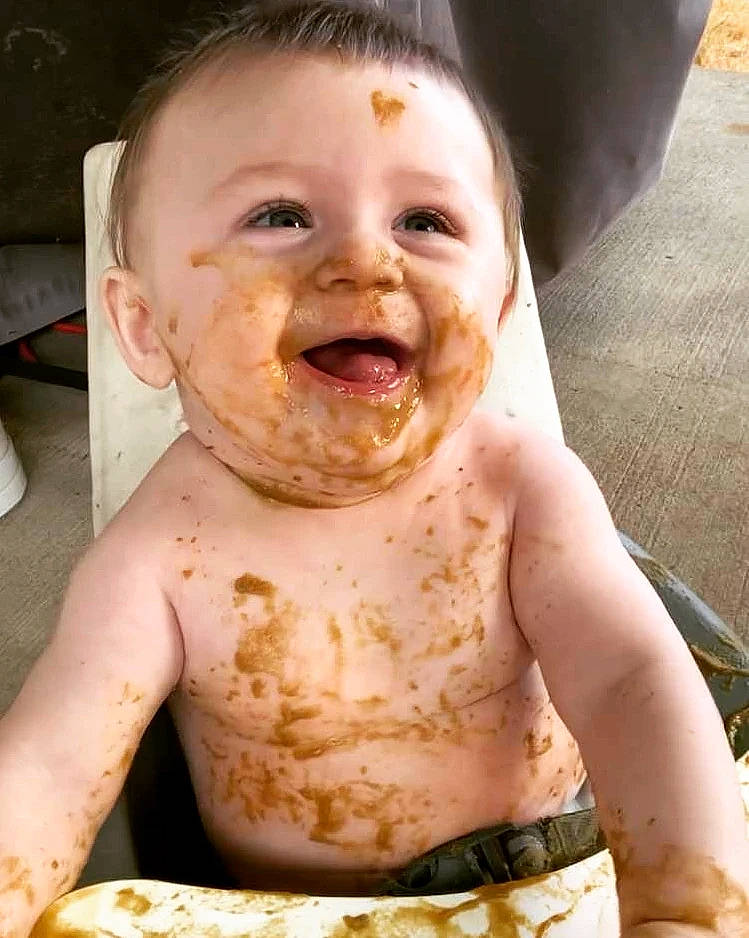 Lucian is registered to the contest to win money with this photo: baby, cheek, chest, child, eyelash, face, fun, gesture, happy, head, human_body, jaw, lip, mouth, neck, nose, person, skin, smile, toddler