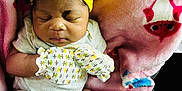 Mckenzie joined the competition — help win amazing prizes! baby, newborn, sleeping, yellow_bow, mittens, pink_blanket, infant, cute, soft, cozy, child, patterned, headband, resting, portrait, indoor, comfort, peaceful, adorable, clothing