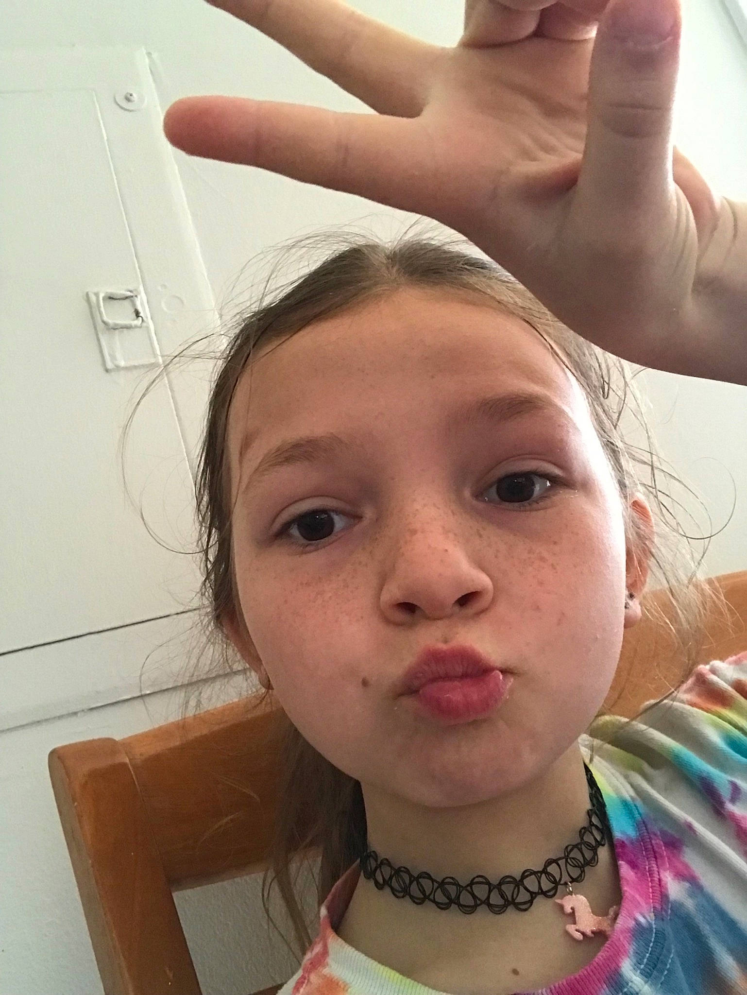 Poopy is registered to the contest to win money with this photo: cheek, child, ear, eyebrow, face, finger, forehead, gesture, hand, head, lip, neck, nose, person, selfie, skin, smile