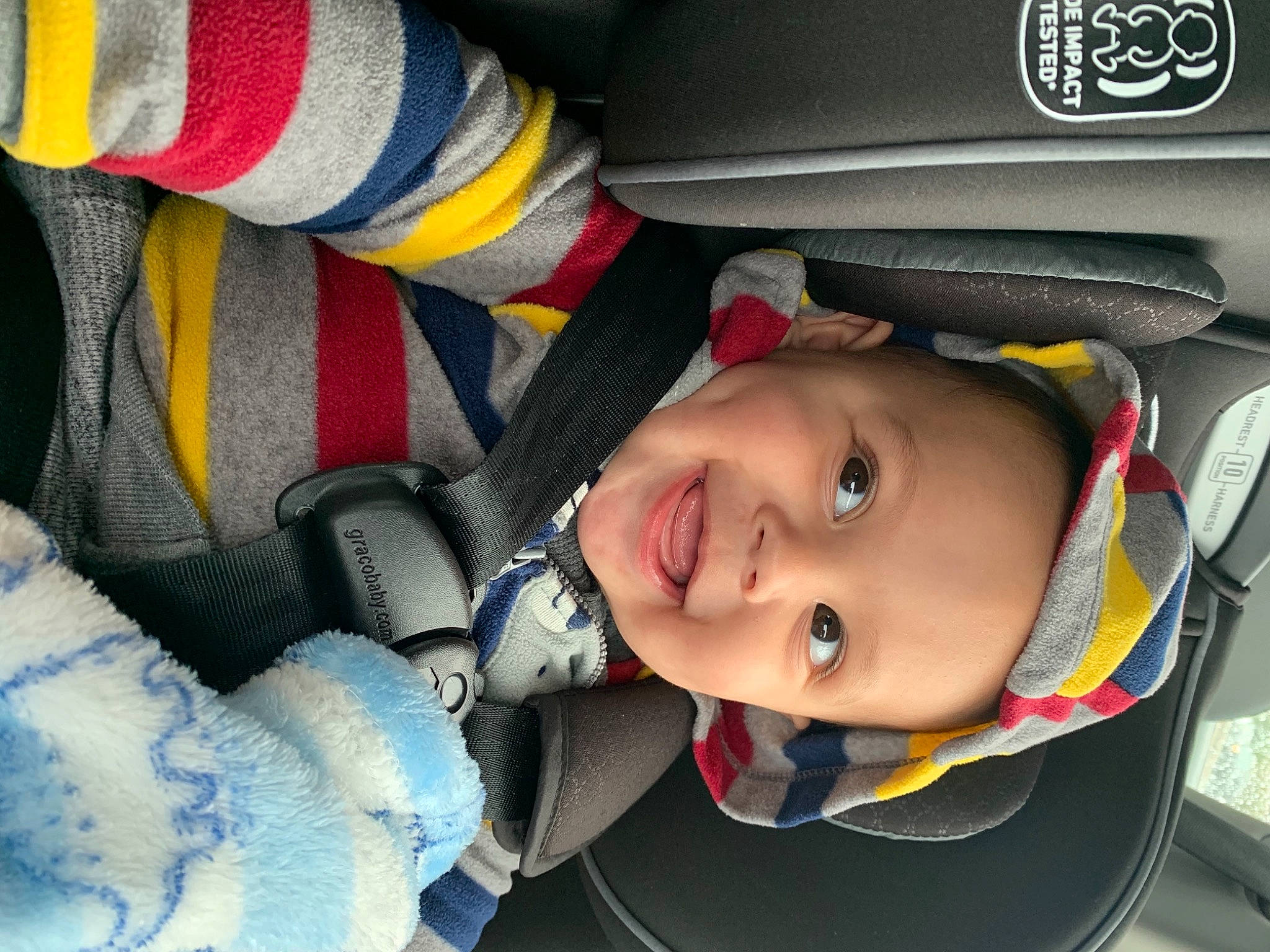 Andre is registered to the contest to win money with this photo: auto_part, automotive_design, automotive_exterior, baby, baby_carriage, car_seat, car_seat_cover, child, comfort, cool, eye, eyebrow, happy, joy, motor_vehicle, mouth, nose, person, smile, toddler