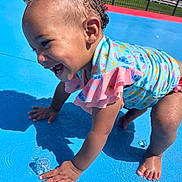 Jade joined the competition — help win amazing prizes! toddler, child, water, splash, swimsuit, outdoor, play, happy, smile, sunlight, skin, hand, foot, blue, colorful, summer, fun, wet, cute, joy