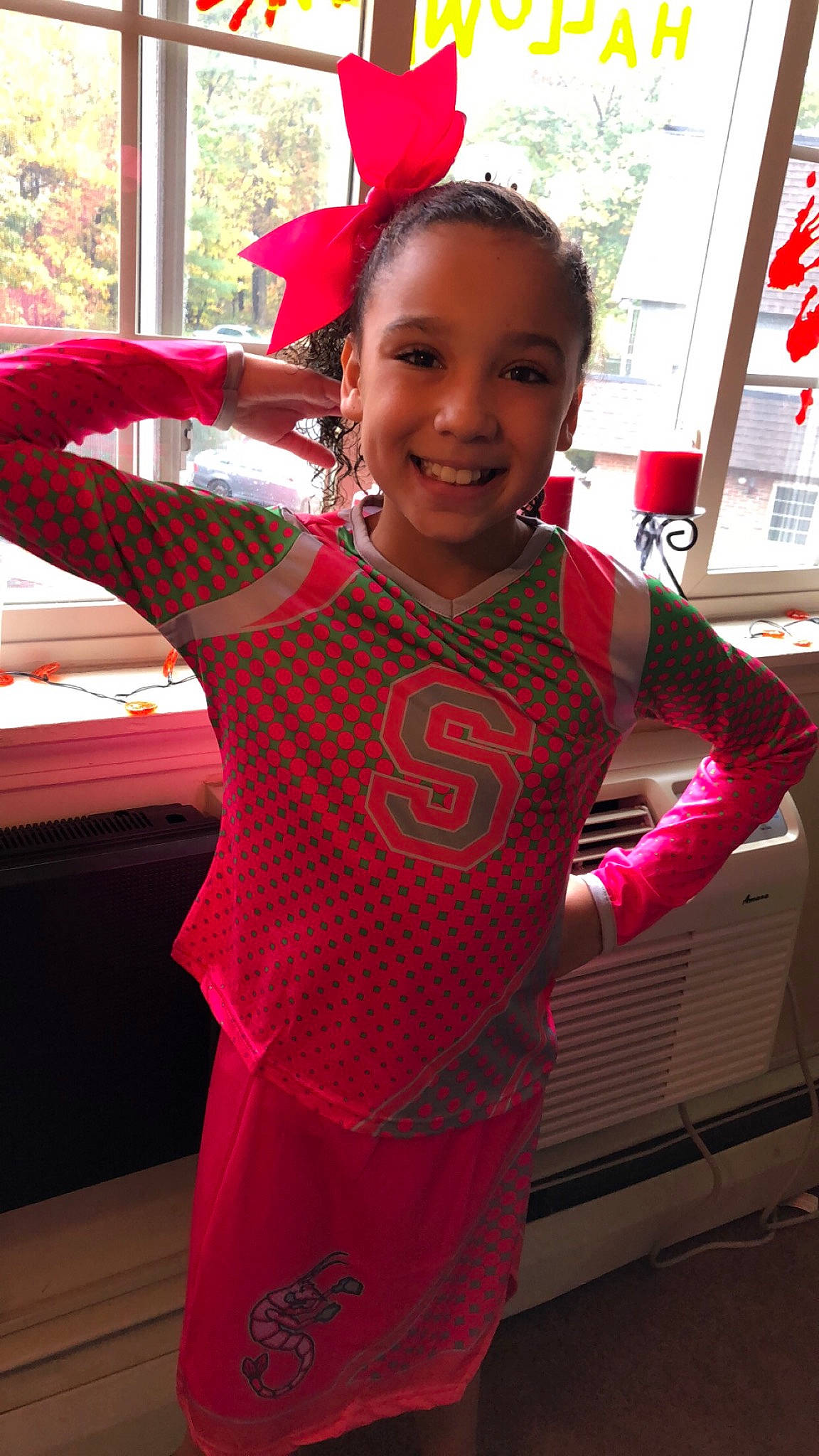 Cambri joined the competition — help win amazing prizes! child, clothing, costume, day, design, dress, fun, girl, joy, magenta, outerwear, pattern, person, pink, product, red, shoulder, smile, t_shirt, textile