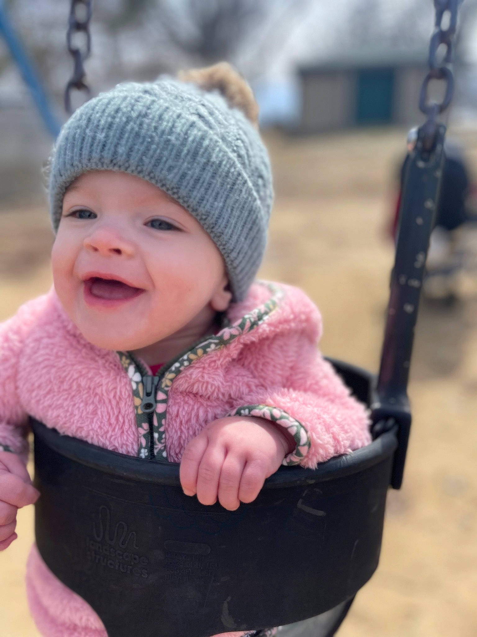 Everlee is registered to the contest to win money with this photo: baby, baby_toddler_clothing, cap, cheek, cool, eye, face, happy, head, headgear, headwear, jacket, person, photograph, pink, product, skin, sleeve, smile, swing