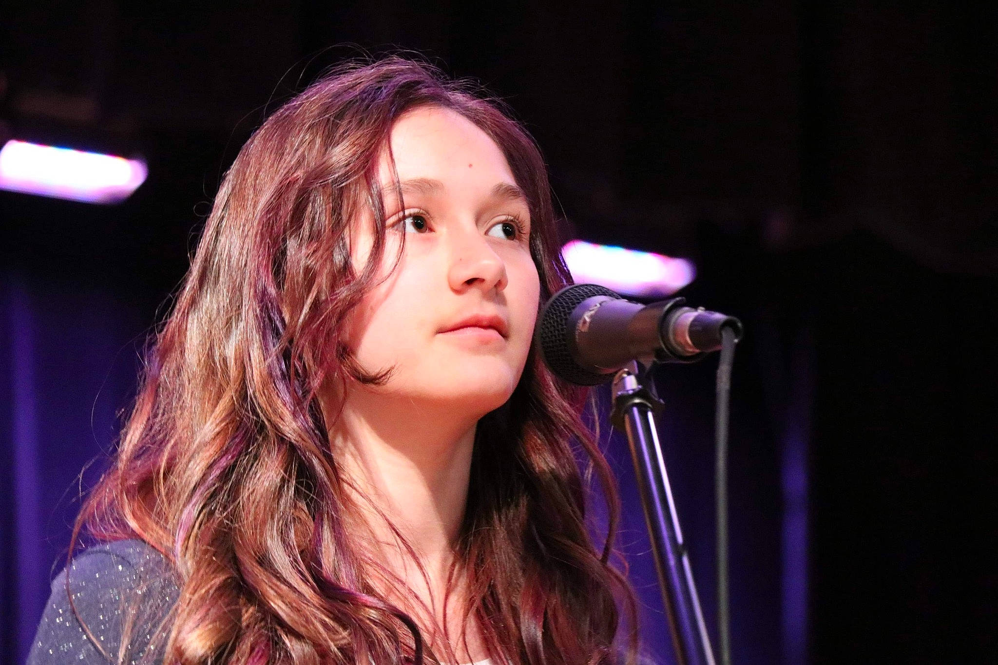 Callieondra joined the competition — help win amazing prizes! artist, audio_equipment, chin, concert, entertainment, event, eyelash, lip, microphone, microphone_stand, music, music_artist, music_venue, musician, performing_arts, person, pop_music, public_address_system, purple, singer