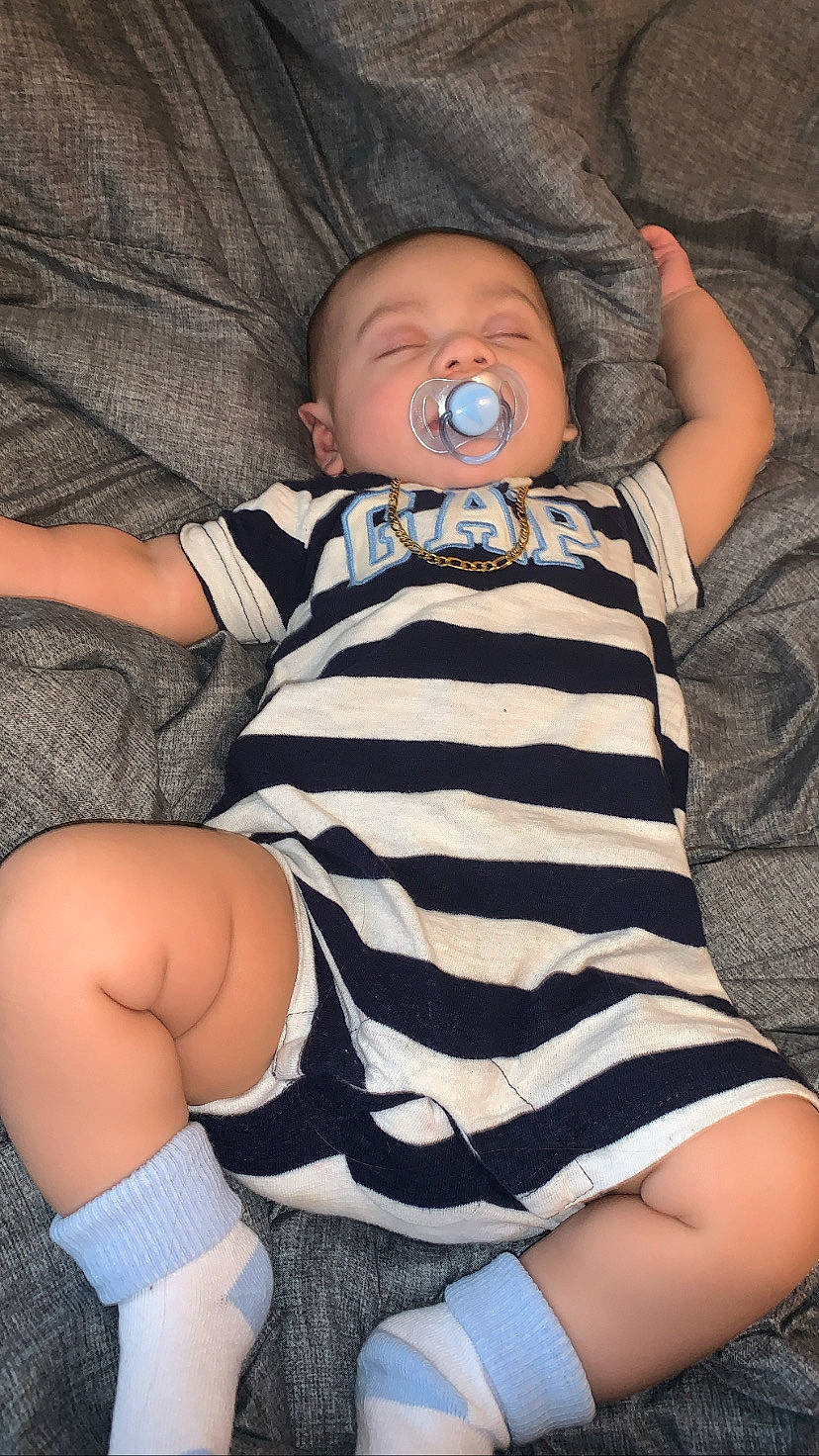 Carlos joined the competition — help win amazing prizes! baby, baby_toddler_clothing, child, comfort, eye, facial_expression, finger, human_body, joint, knee, leg, mouth, organ, people, person, photograph, skin, sleeve, textile, thigh