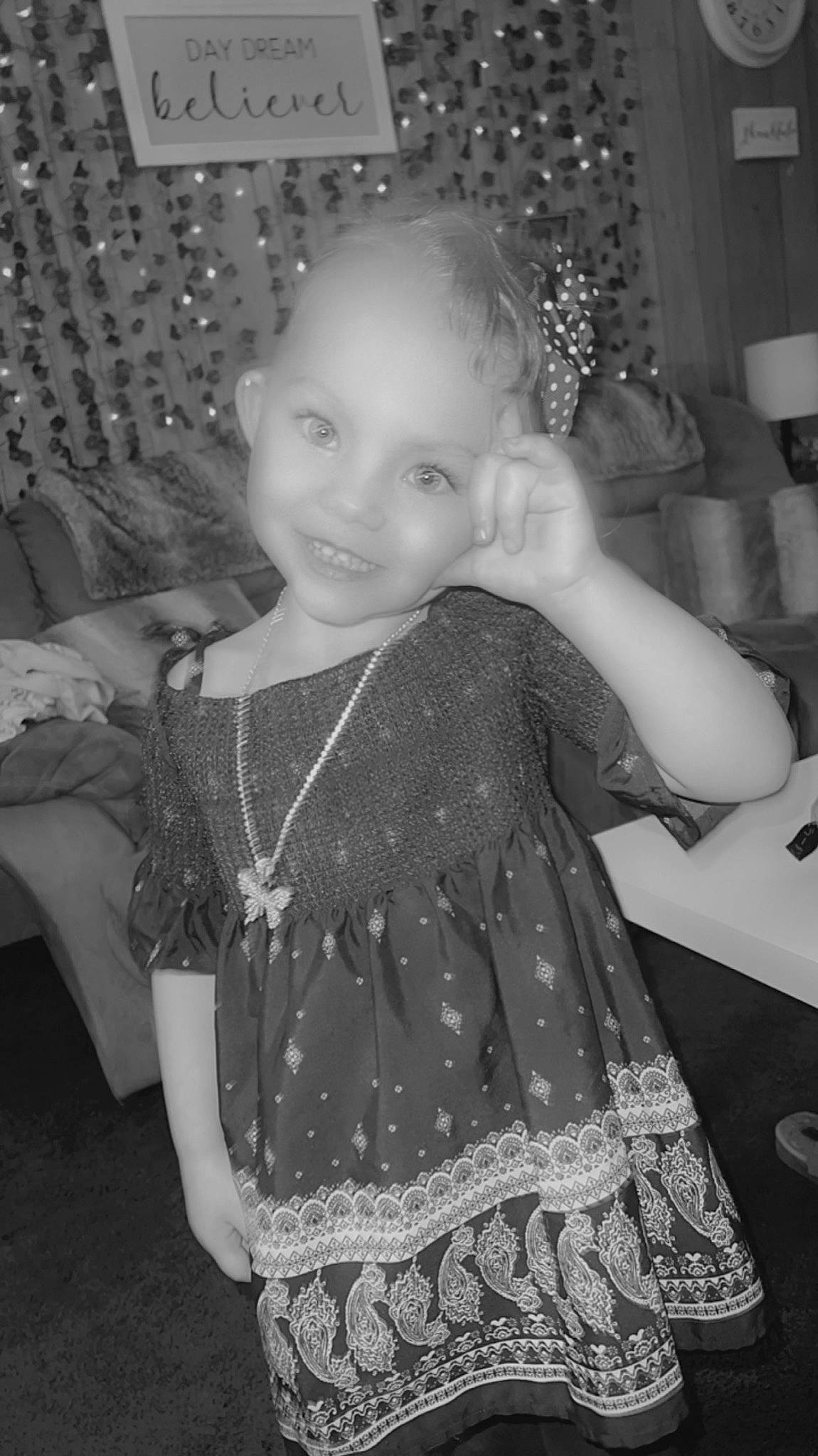 Kinsley is registered to the contest to win money with this photo: baby_toddler_clothing, black, black_and_white, child, dress, facial_expression, fashion, flash_photography, fun, hairstyle, happy, human, iris, joy, monochrome, monochrome_photography, person, sleeve, smile, standing