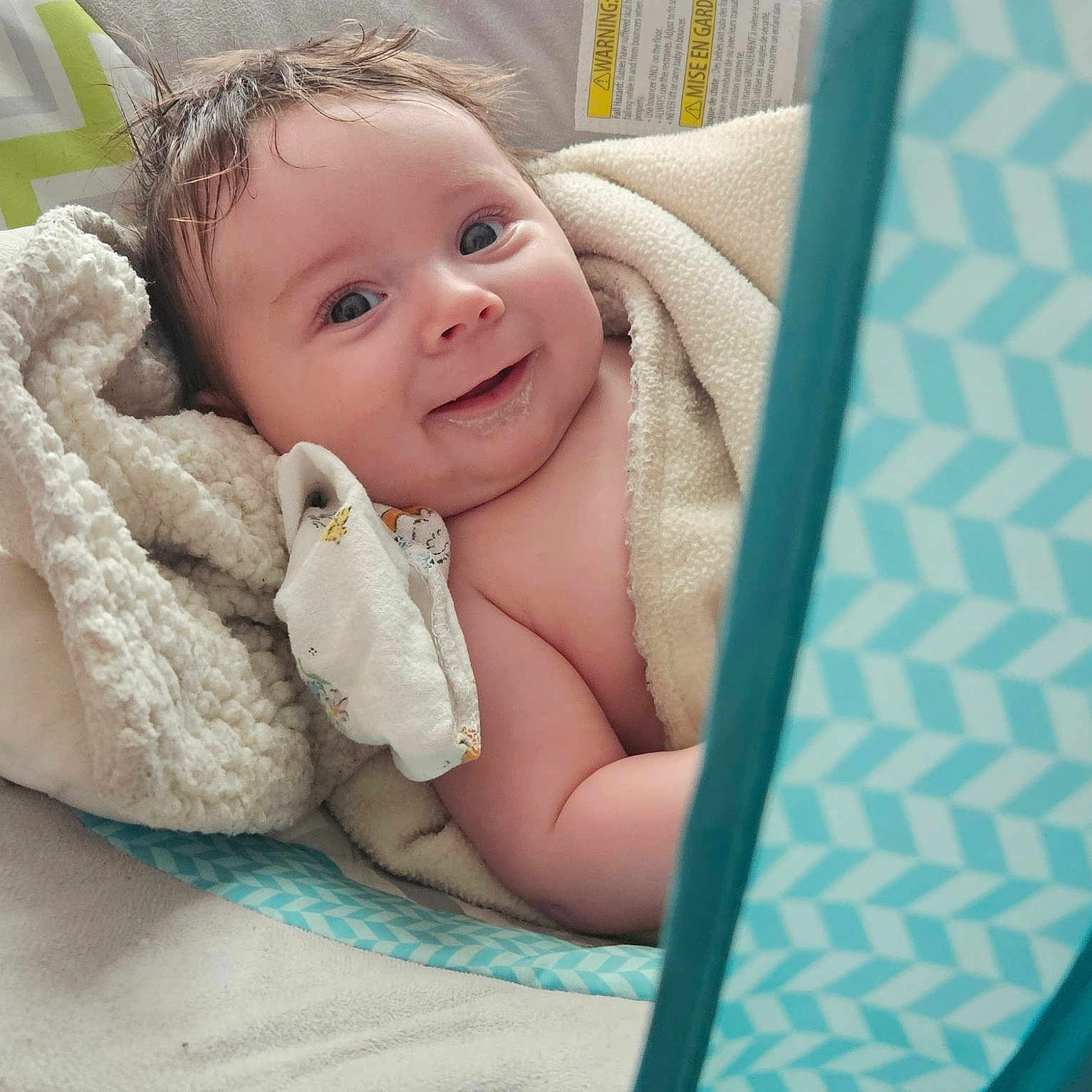 Donald joined the competition — help win amazing prizes! baby, bed, bedroom, blanket, crib, cushion, face, furniture, happy, head, homedecor, indoors, infantbed, newborn, person, photography, portrait, quilt, smile, towel