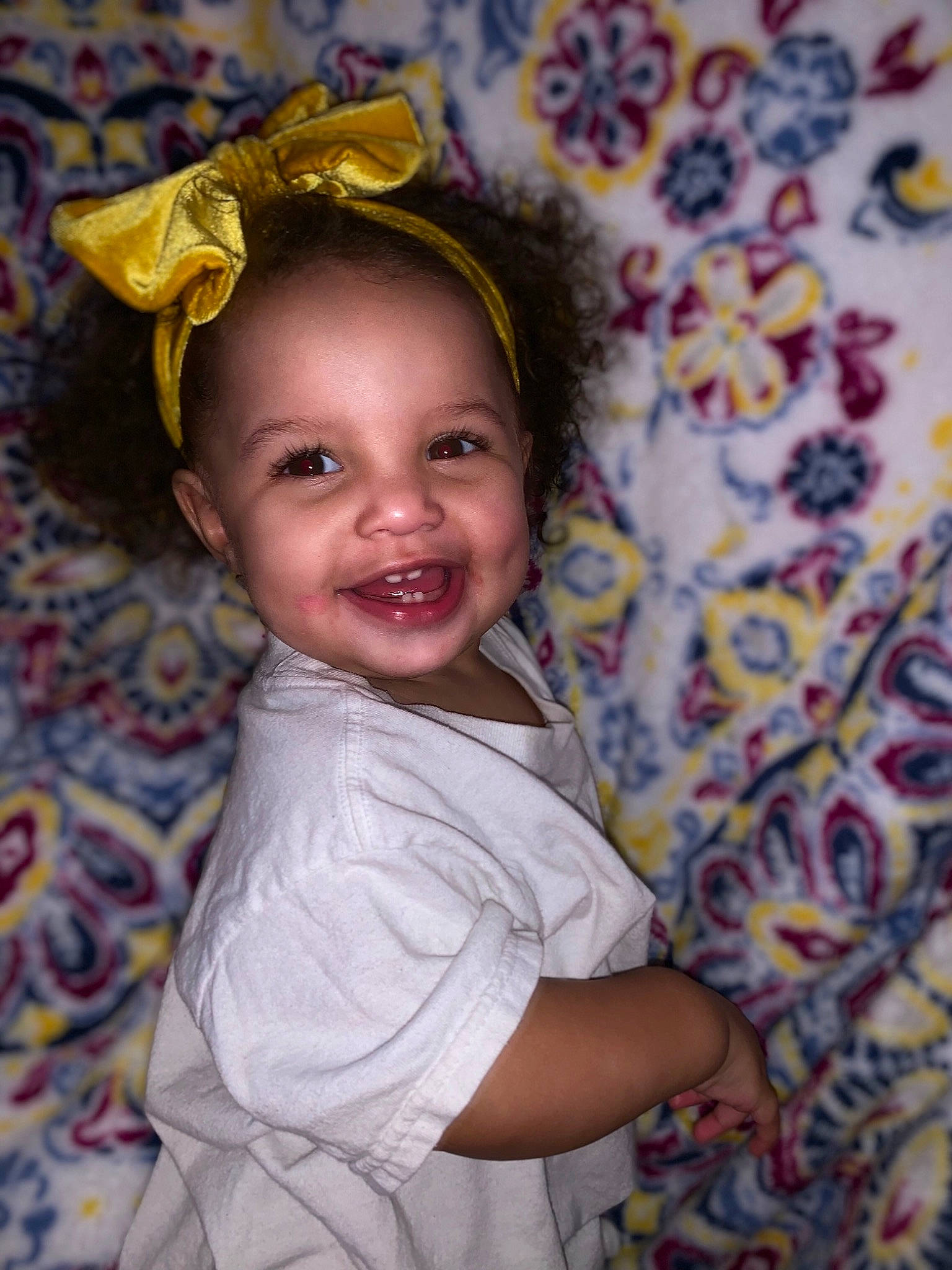 Kynslee Elizabeth is registered to the contest to win money with this photo: baby, cheek, child, facial_expression, fashion_accessory, fun, hair_accessory, happy, head, headgear, iris, joy, laugh, person, skin, smile, toddler, yellow
