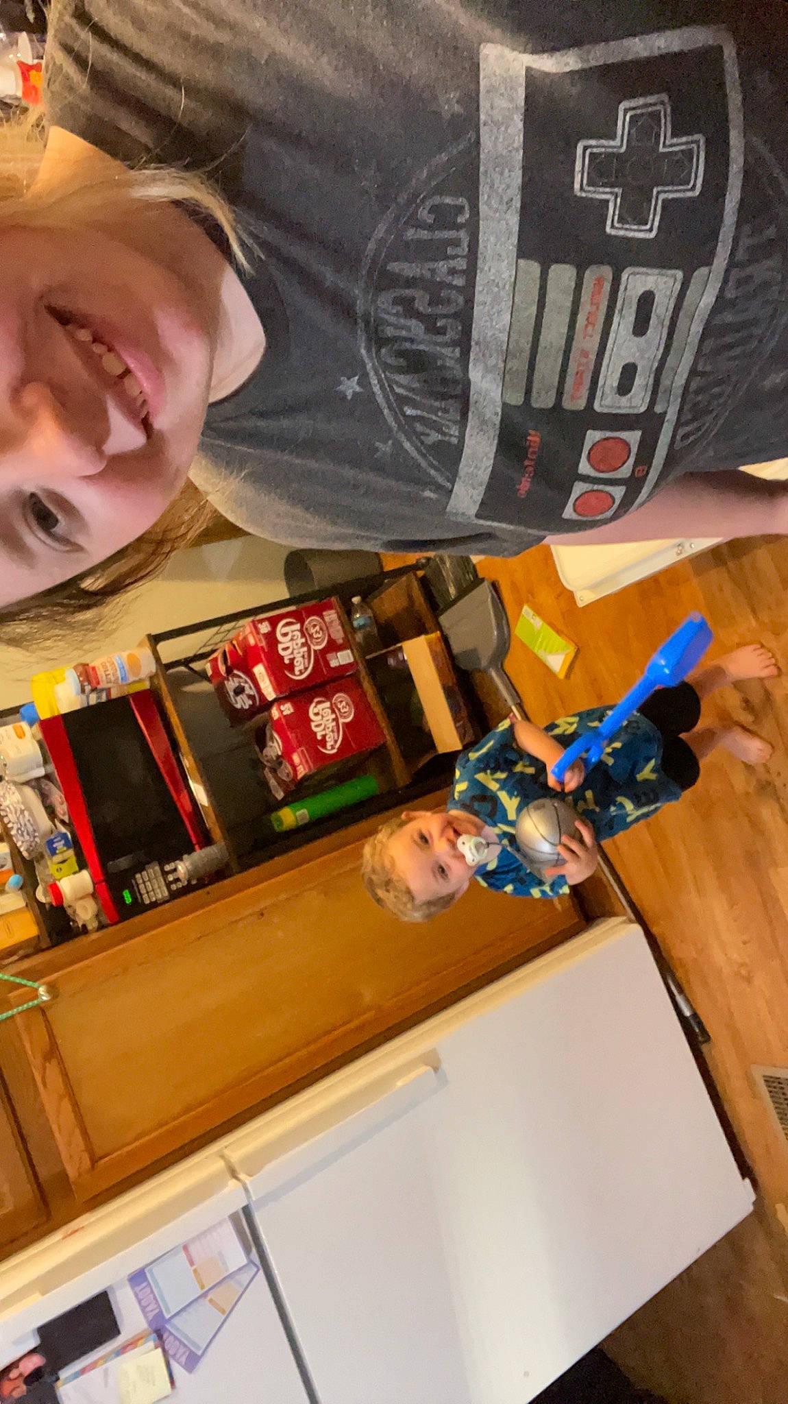 Tanner Flannery joined the competition — help win amazing prizes! child, flooring, font, fun, happy, joy, machine, person, room, shelving, sleeve, smile, sportswear, t_shirt, wood