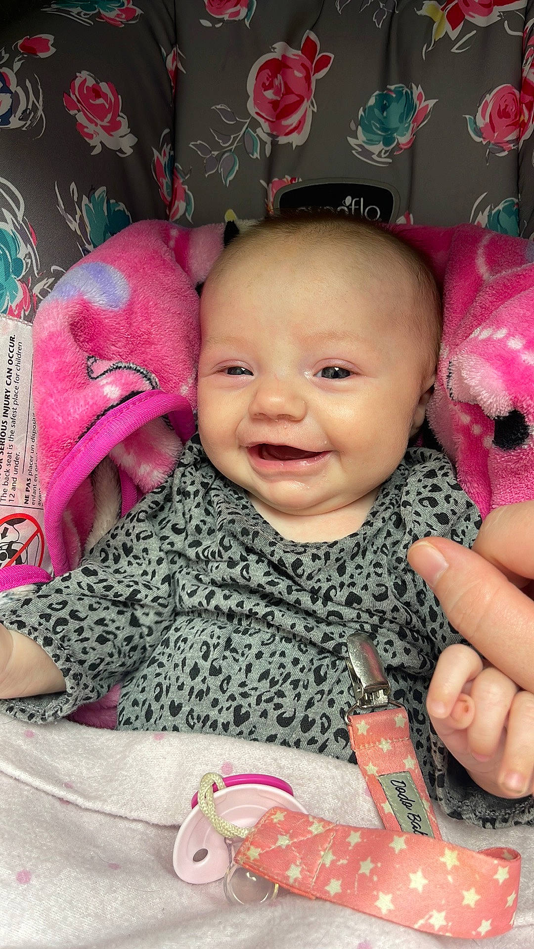 Aubree is registered to the contest to win money with this photo: baby, baby_toddler_clothing, cheek, chin, eye, eyebrow, eyelash, face, finger, gesture, happy, headgear, lip, nose, person, pink, red, skin, smile, textile