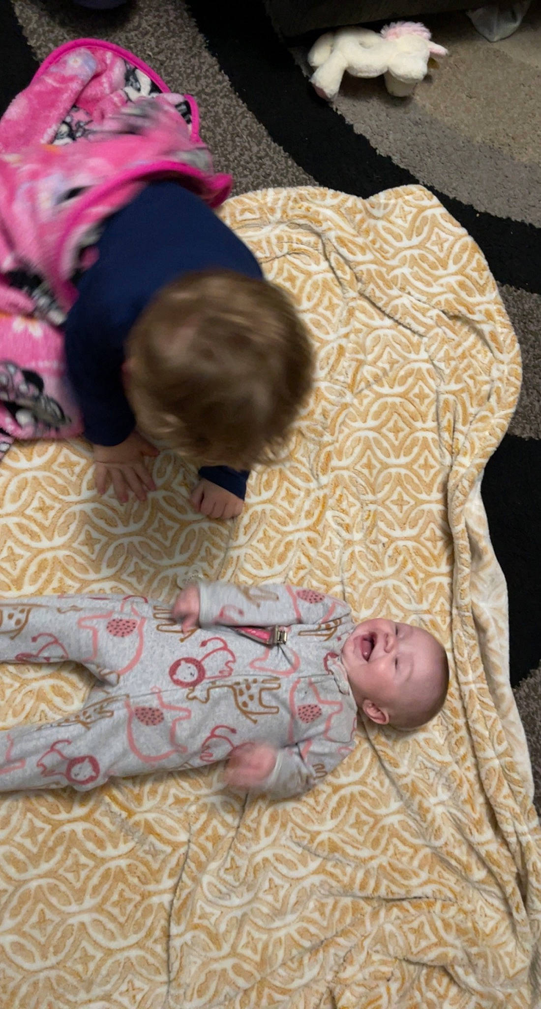 Aubree is registered to the contest to win money with this photo: baby, baby_toddler_clothing, bed, bed_sheet, bedding, bedtime, carpet, child, comfort, flooring, linens, mammal, nap, pattern, person, pink, room, skin, textile, toddler