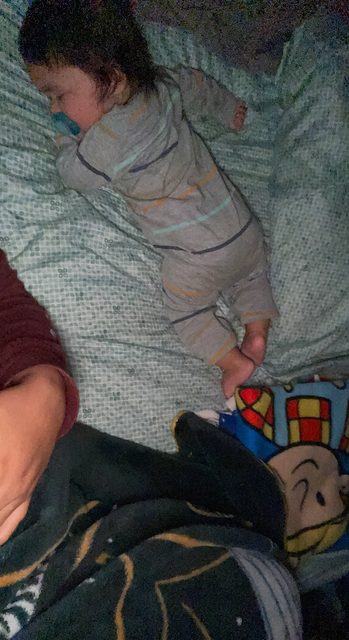 Huxley is registered to the contest to win money with this photo: arm, art, comfort, elbow, finger, flooring, fun, grey, human, human_body, human_leg, leg, mammal, mouth, nail, pattern, person, thigh, thumb, vertebrate