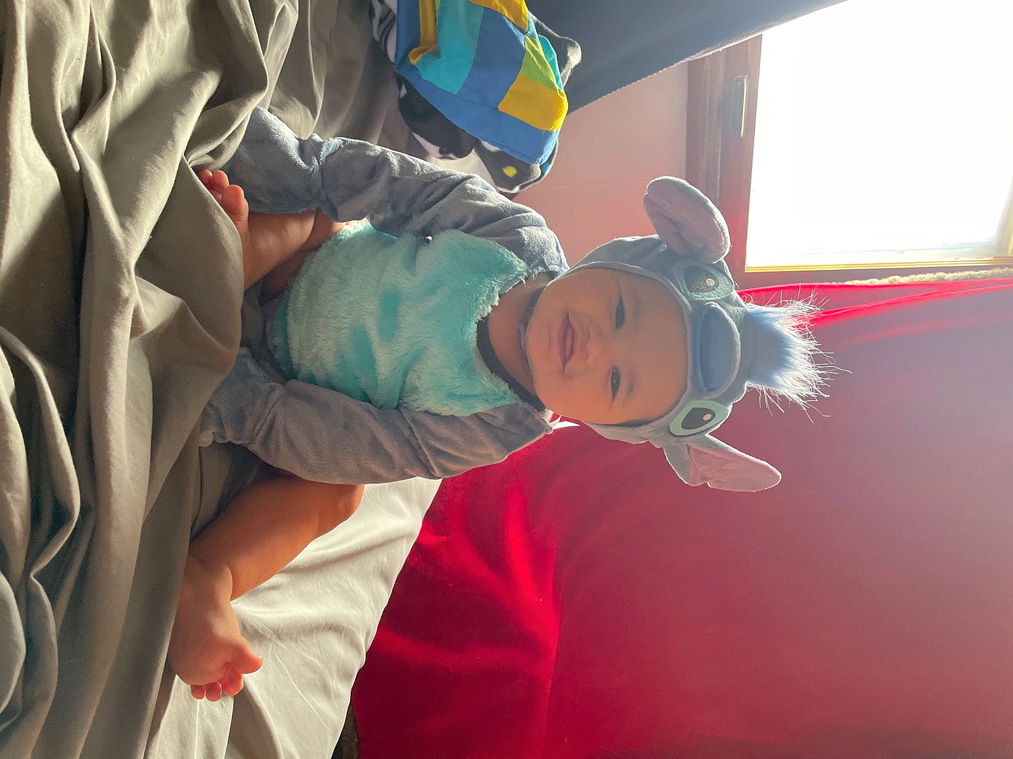 Huxley joined the competition — help win amazing prizes! baby, child, comfort, costume, event, fun, happy, hat, headwear, leisure, magenta, person, personal_protective_equipment, recreation, room, smile, toddler, window