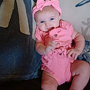 Mckinleigh joined the competition — help win amazing prizes! baby, bodypart, bonnet, cap, clothing, couch, cushion, diaper, face, finger, furniture, hand, hat, head, homedecor, newborn, person, photography, portrait, sitting