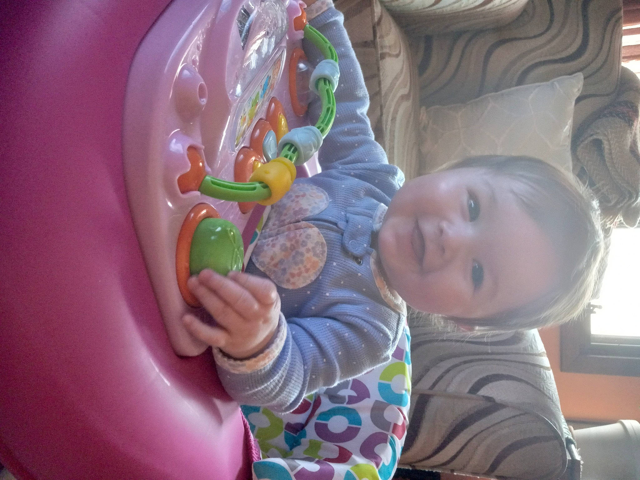 Genevieve joined the competition — help win amazing prizes! baby, baby_playing_with_toys, baby_products, baby_toddler_clothing, baby_toys, bathing, cheek, child, eye, fun, happy, human_body, leisure, person, pink, play, sitting, smile, sweetness, toddler