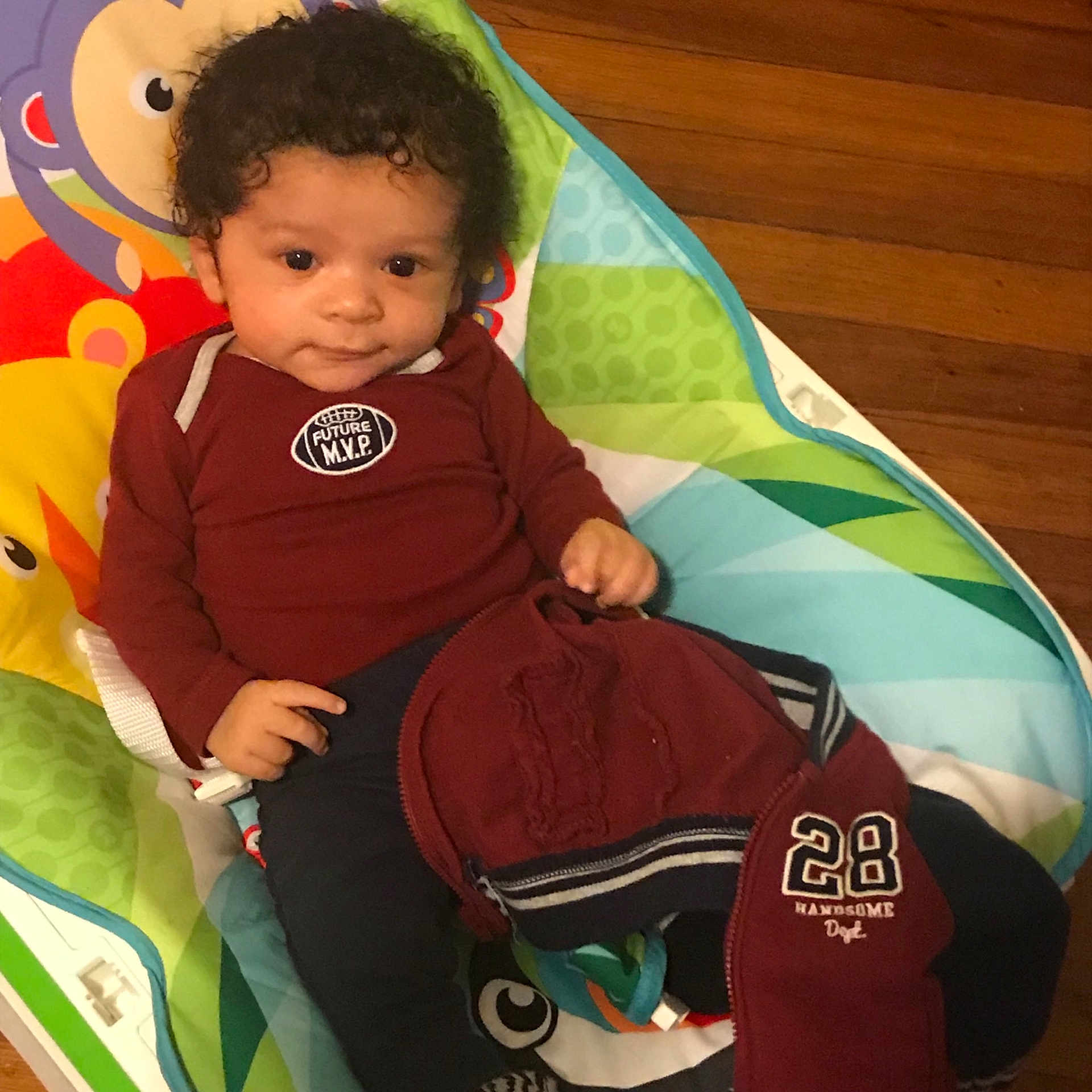 Kavon is registered to the contest to win money with this photo: baby_products, boy, child, cool, fun, green, infant, person, play, product, smile, toddler