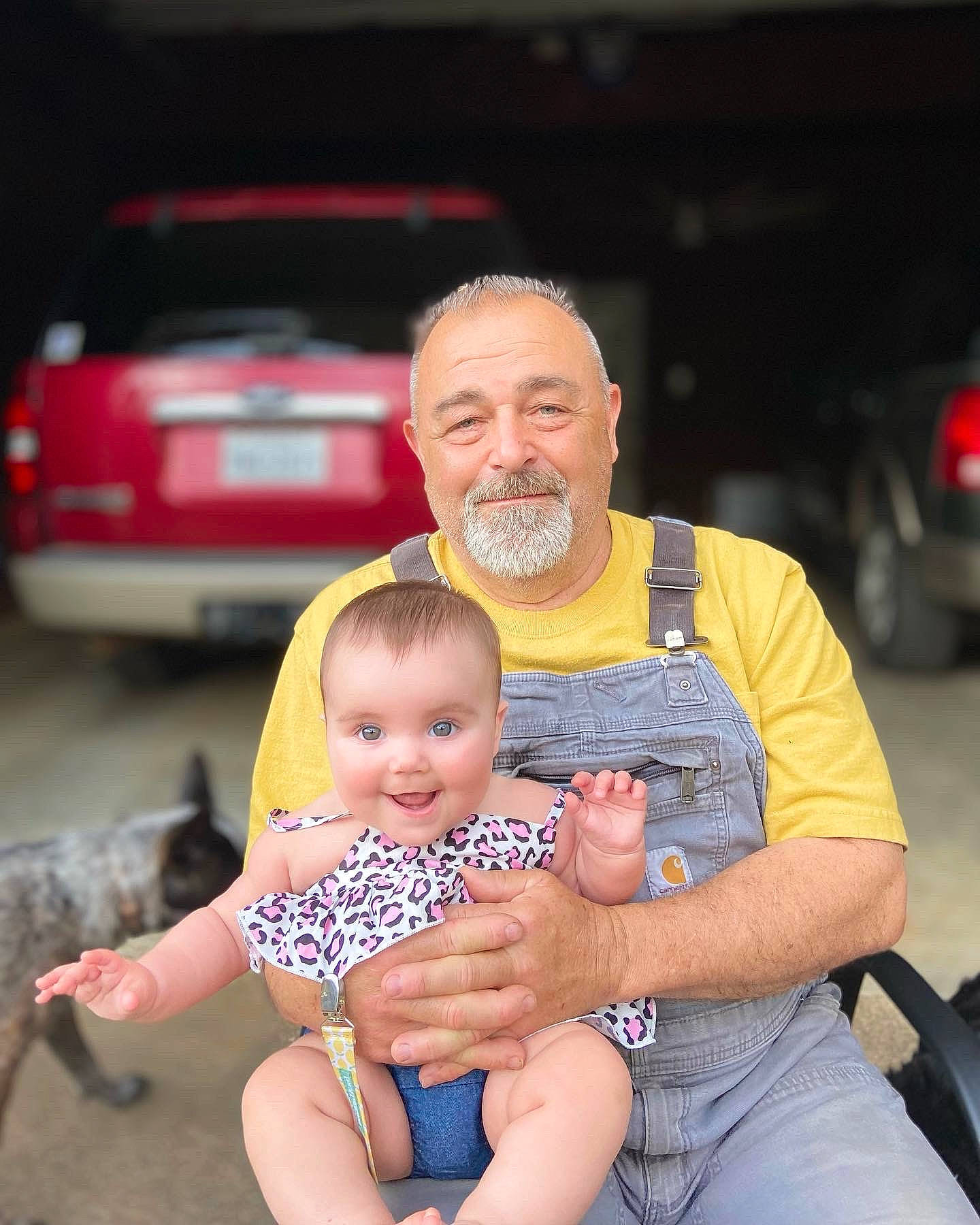 Jolene is registered to the contest to win money with this photo: automotive_lighting, baby, event, family_car, fun, grass, happy, joy, lap, leisure, motor_vehicle, organ, person, recreation, shorts, sitting, skin, smile, summer, t_shirt