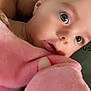 Oaklynn joined the competition — help win amazing prizes! baby, child, blanket, closeup, face, infant, pink, soft, wrapped, curious, wide_eyes, skin, person, cuddling, comfort, warmth, portrait, expression, young, adult_arm