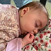 Oaklynn is registered to the contest to win money with this photo: baby, sleeping, blanket, floral, onesie, hand, face, closeup, peaceful, infant, child, cozy, soft, cute, rest, portrait, indoors, skin, eyelashes, hair