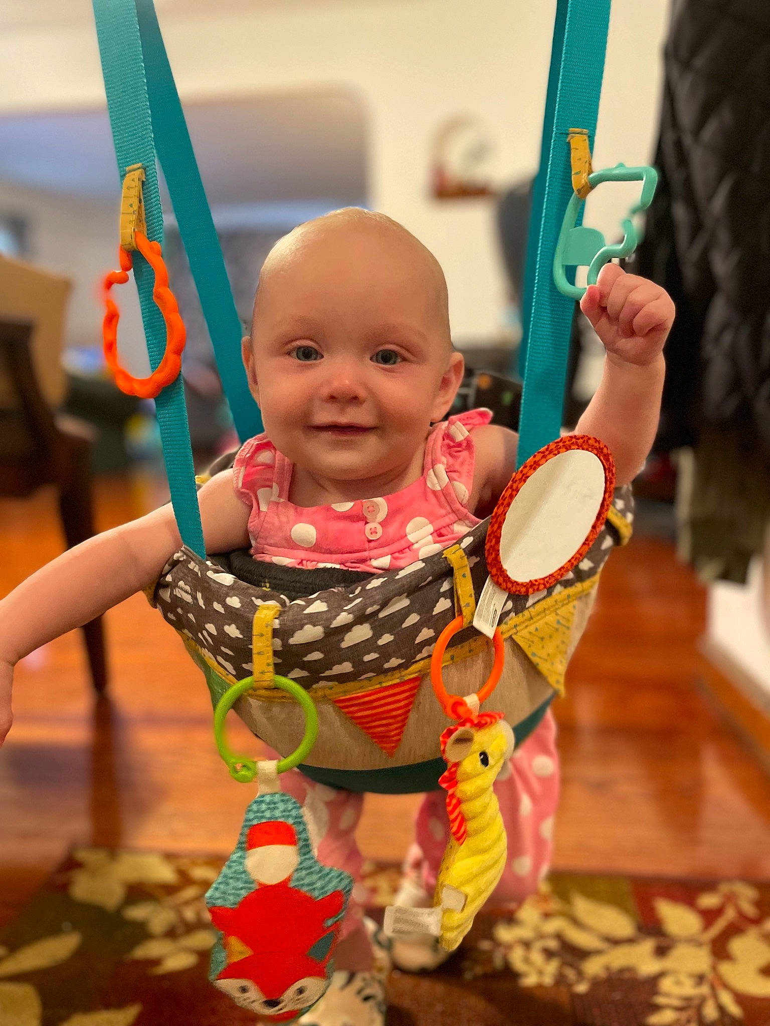 Emelia is registered to the contest to win money with this photo: baby, baby_products, baby_toddler_clothing, child, city, event, eye, fun, happy, joy, leisure, outdoor_play_equipment, person, play, public_space, recreation, red, smile, swing, toddler