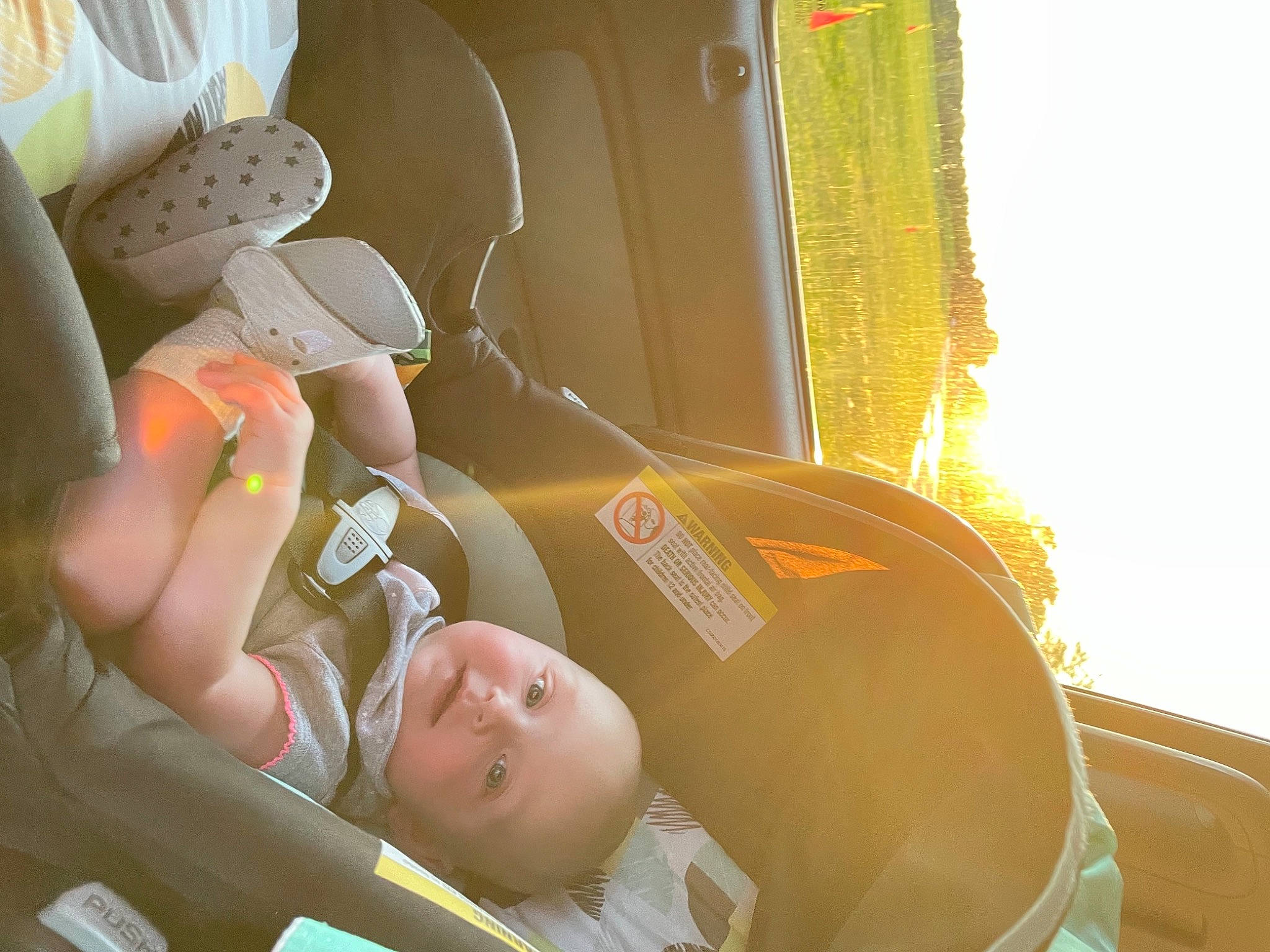 Emelia joined the competition — help win amazing prizes! auto_part, automotive_design, automotive_exterior, automotive_lighting, baby, baby_products, car_seat, comfort, eyewear, family_car, fun, grass, human_body, leg, leisure, person, sitting, tints_and_shades, toddler, vehicle_door