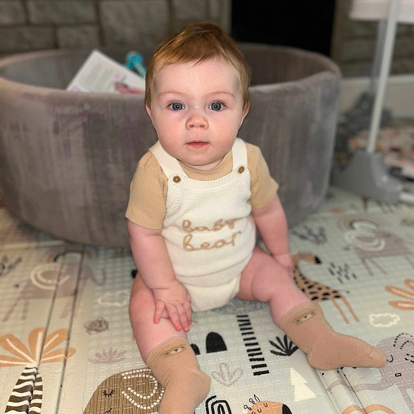 Ovie joined the competition — help win amazing prizes! accessories, architecture, baby, building, clothing, crawling, face, furniture, head, hosiery, indoors, livingroom, pants, person, photography, portrait, room, sitting, sock, text