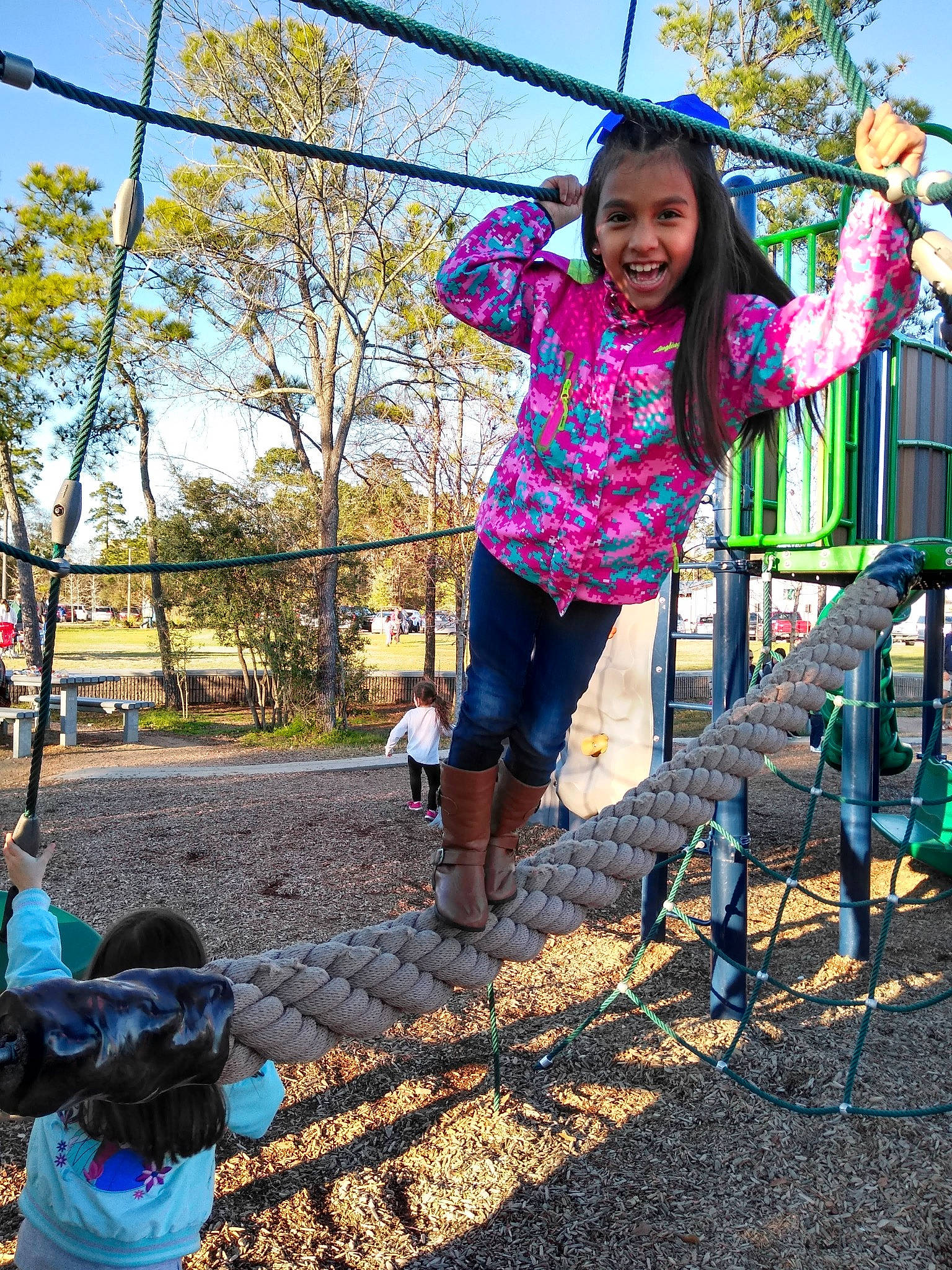 Alondra is registered to the contest to win money with this photo: adaptation, branch, child, community, fun, human_settlement, joy, leaf, leisure, outdoor_play_equipment, person, plant, play, playground, public_space, recreation, smile, soil, spring, swing