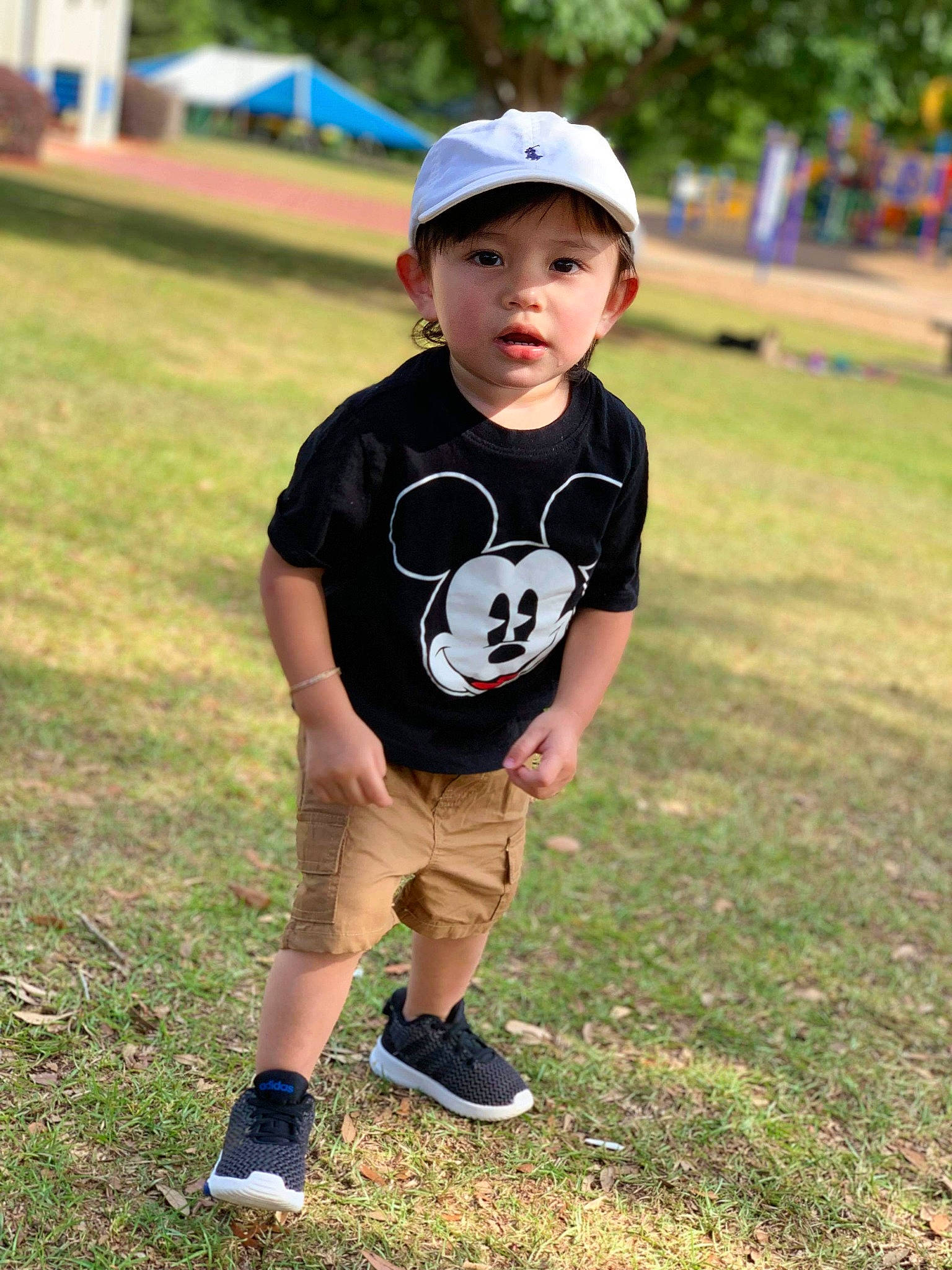 Elian joined the competition — help win amazing prizes! ball, child, fun, grass, happy, headwear, male, person, play, sleeve, smile, soccer_ball, t_shirt, toddler