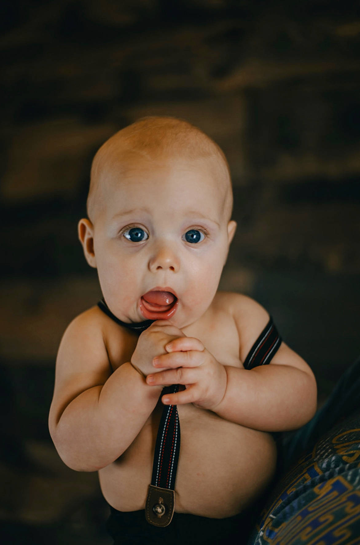 Karsen is registered to the contest to win money with this photo: baby, cheek, child, chin, eye, face, finger, flash_photography, hand, head, lip, nose, person, photography, portrait_photography, sitting, skin, surprise, toddler