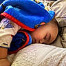 baby, bed, blanket, blue_blanket, child, closeup, comfortable, cozy, cute, face, indoor, infant, nap, peaceful, person, pillow, rest, sleeping, soft, toddler
