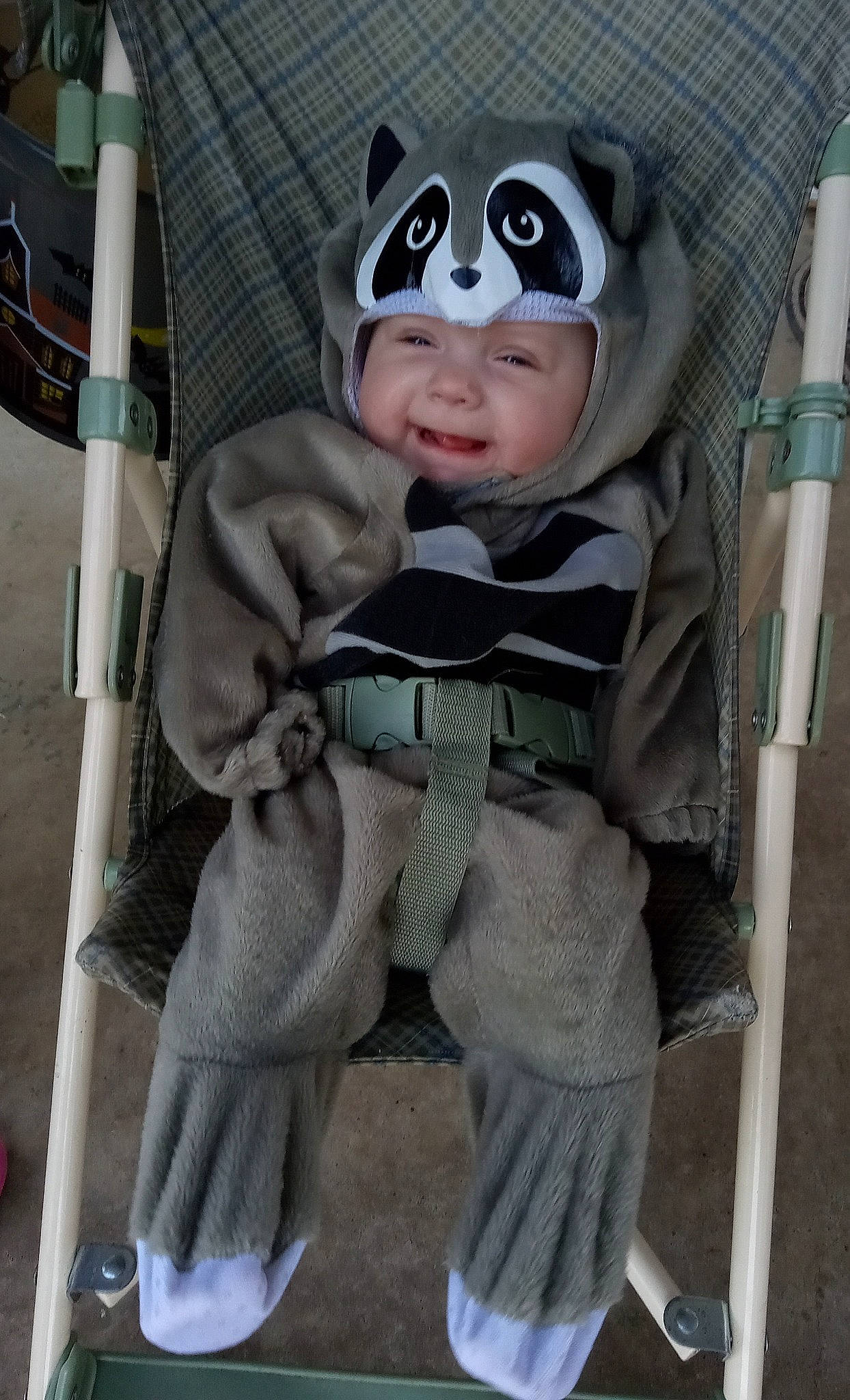 Madelyn is registered to the contest to win money with this photo: baby, baby_carriage, baby_products, baby_safety, baby_toddler_clothing, car_seat, cheek, child, comfort, fun, fur, headgear, headwear, person, personal_protective_equipment, product, sitting, sleeve, smile, toddler