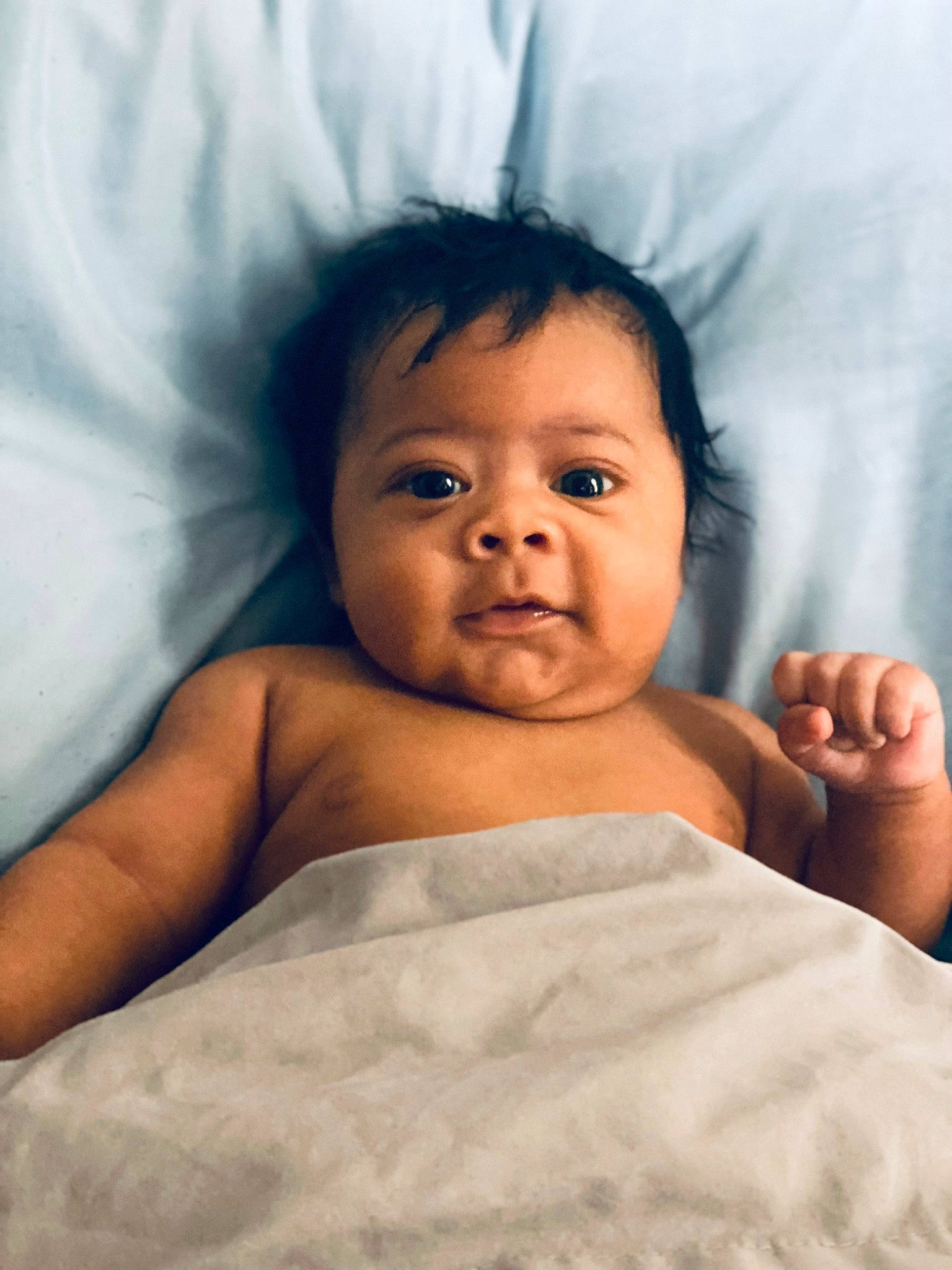 Alijah is registered to the contest to win money with this photo: azure, baby, cheek, chin, comfort, eyebrow, eyelash, face, facial_expression, flash_photography, head, iris, lip, mammal, mouth, muscle, neck, nose, person, skin