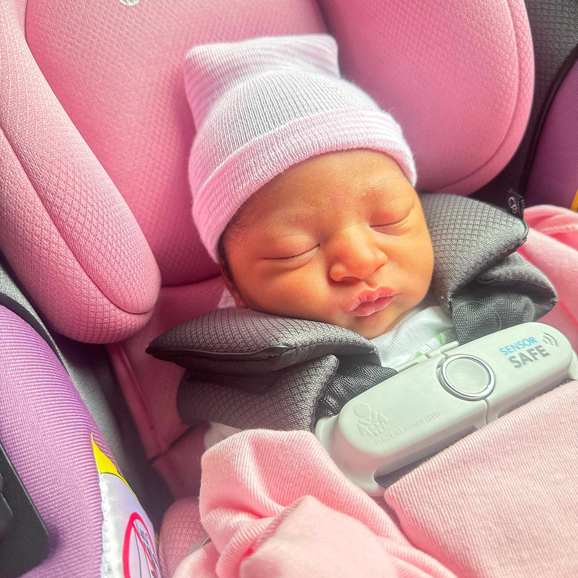 Daria joined the competition — help win amazing prizes! baby, blanket, car_seat, child, child_seat, closeup, comfort, cute, face, hat, infant, newborn, peaceful, pink, rest, safety, sleeping, soft, stripes, tiny