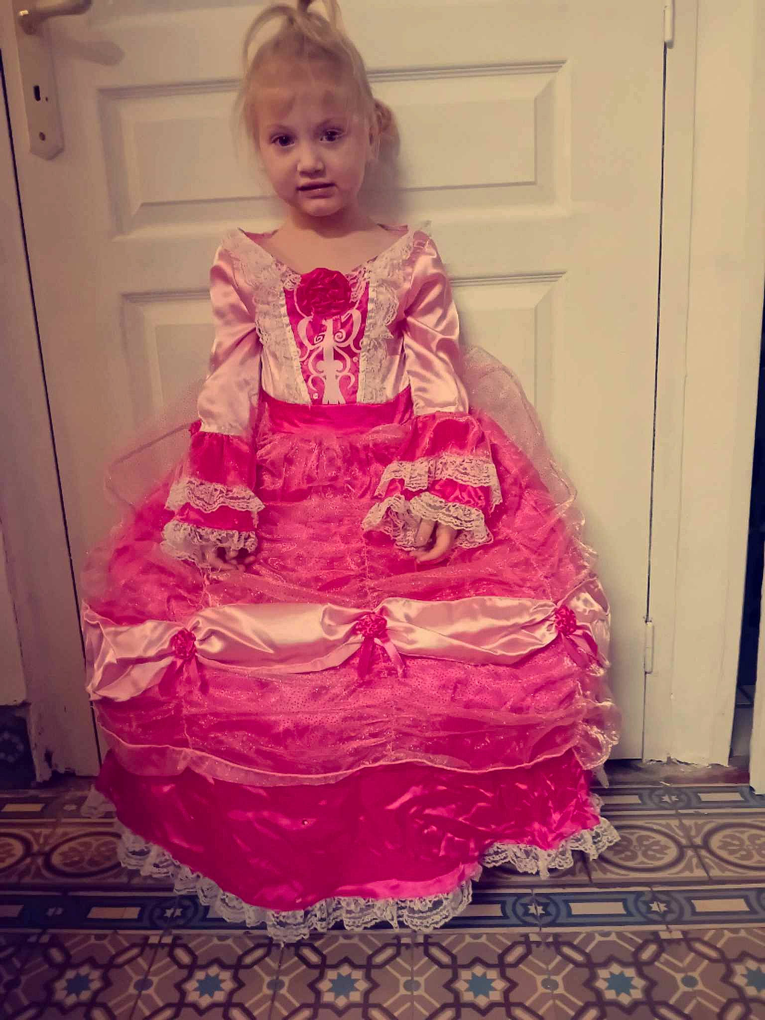 Wendy participe au concours pour gagner de l'argent avec cette photo : arm, baby_toddler_clothing, door, dress, embellishment, fashion_design, floor, flooring, formal_wear, gown, hair, happy, head, long_hair, magenta, one_piece_garment, person, pink, purple, shoulder