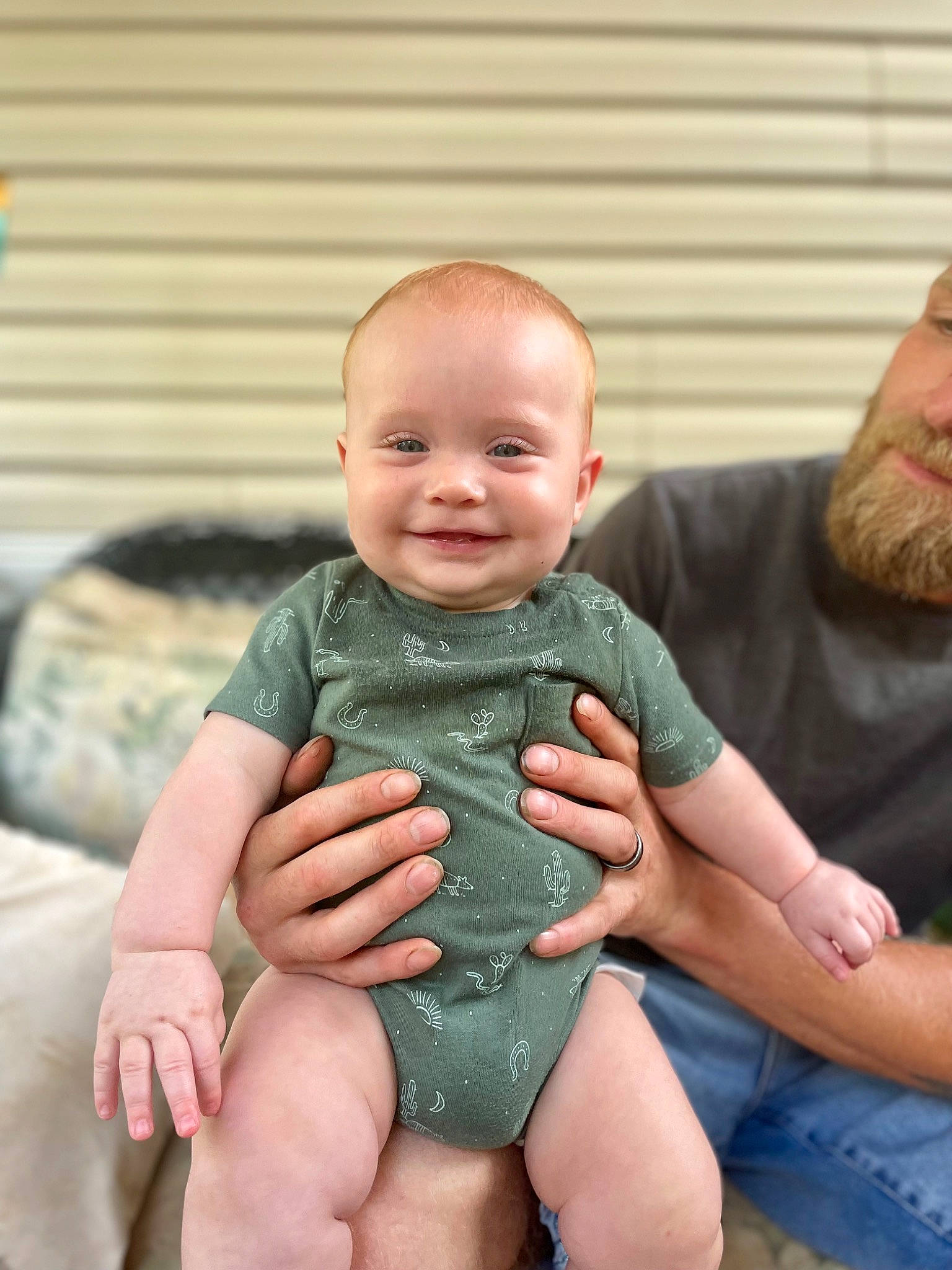 Cooper is registered to the contest to win money with this photo: abdomen, baby, baby_toddler_clothing, cheek, chest, child, comfort, finger, happy, joint, joy, lap, leg, person, sitting, skin, smile, stomach, thigh, thumb