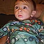 Hudson joined the competition — help win amazing prizes! toddler, child, face, eyes, clothing, pattern, tractor, indoor, portrait, curious, warm_light, sitting, young_child, baby, person, cute, expression, pajamas, fabric, closeup
