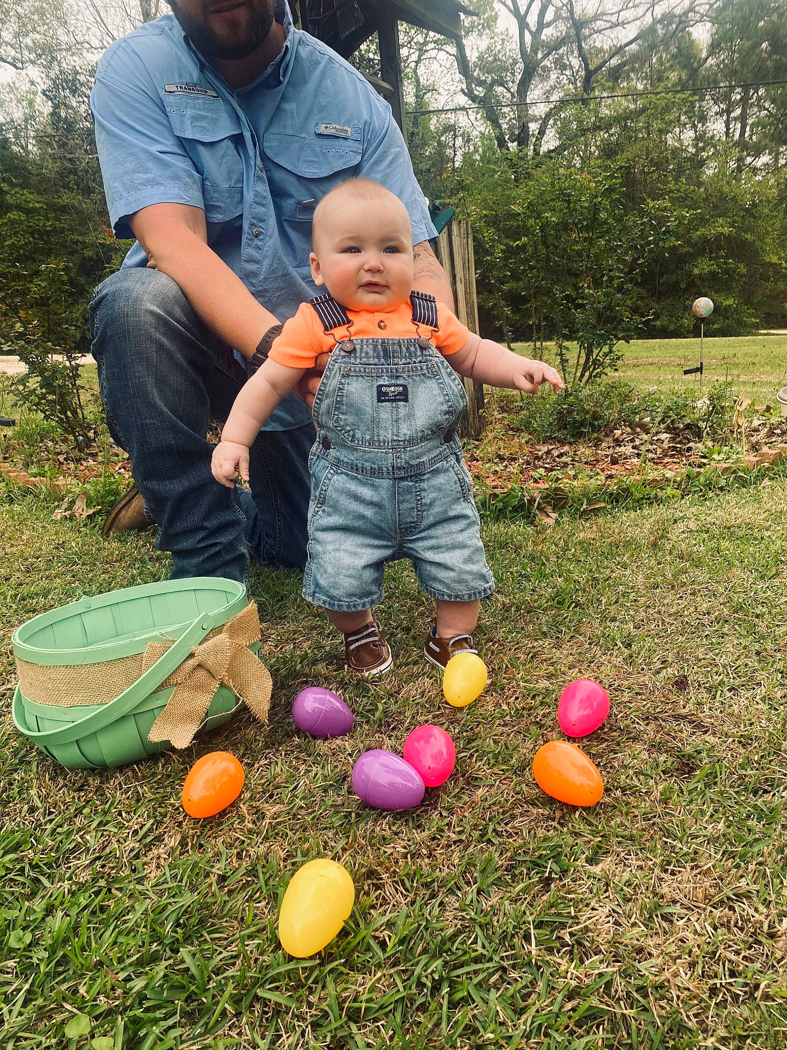 Hunter is registered to the contest to win money with this photo: ball, biome, botany, fun, grass, happy, hat, jeans, leaf, leg, leisure, nature, people_in_nature, person, plant, recreation, sharing, sneakers, toddler, tree