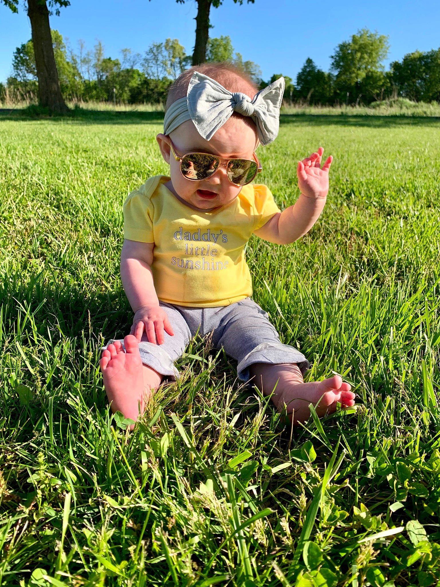 Emeri joined the competition — help win amazing prizes! child, farm, field, finger, fun, grass, grass_family, grassland, happy, lawn, meadow, natural_environment, people_in_nature, person, photography, plant, play, smile, spring, summer