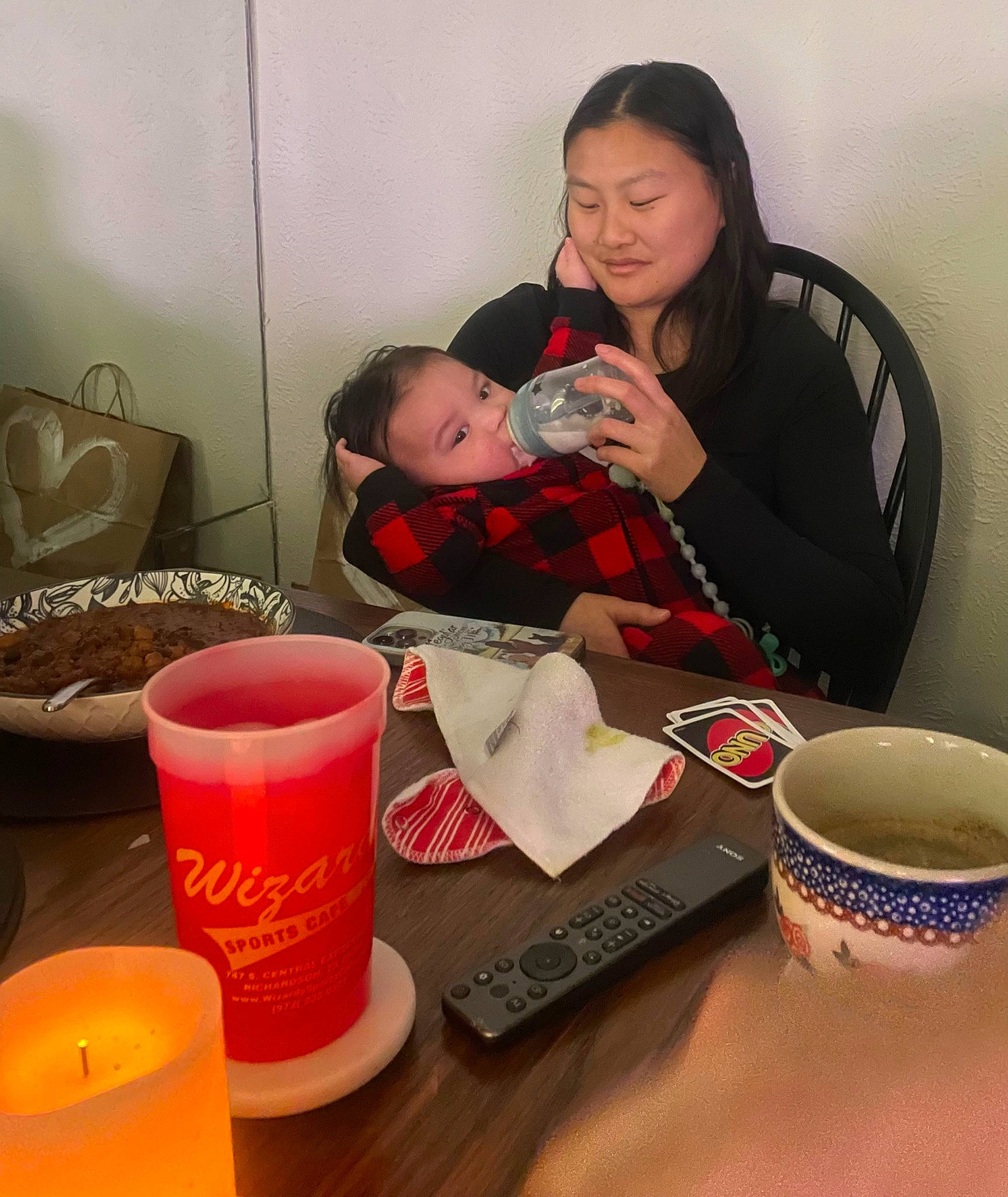 Maximus Sean is registered to the contest to win money with this photo: baby, candle, carmine, chair, comfort, cup, design, desk, drink, drinkware, fun, happy, person, plate, product, serveware, sitting, table, tableware, toddler