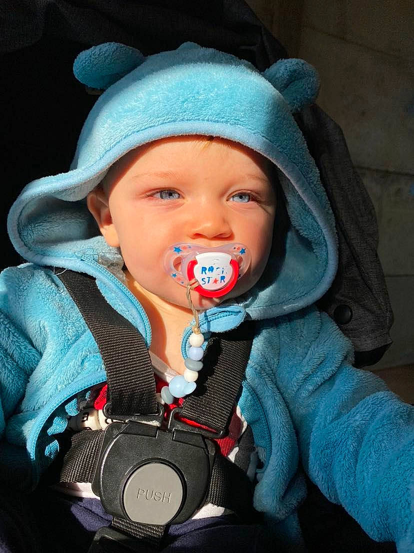 Eden S participe au concours pour gagner de l'argent avec cette photo : baby, baby_carriage, baby_toddler_clothing, car_seat, cheek, cool, ear, electric_blue, eyelash, flash_photography, fun, happy, headwear, iris, jacket, lip, mouth, nose, organ, outerwear