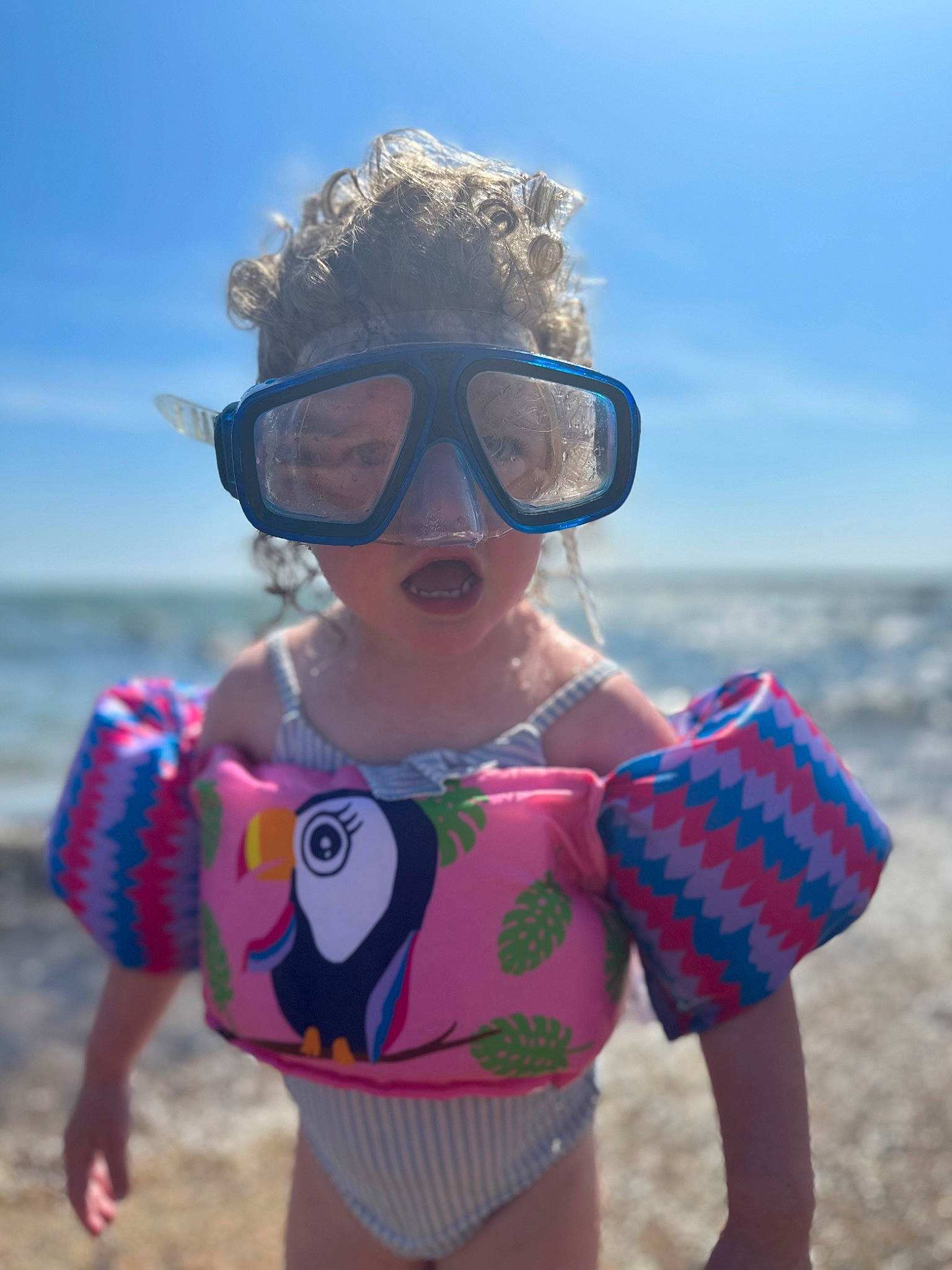 Eleanor joined the competition — help win amazing prizes! azure, body_of_water, cloud, cool, eyewear, fun, glasses, goggles, happy, headgear, leisure, person, personal_protective_equipment, pink, sky, summer, sunglasses, sunlight, toddler, vision_care
