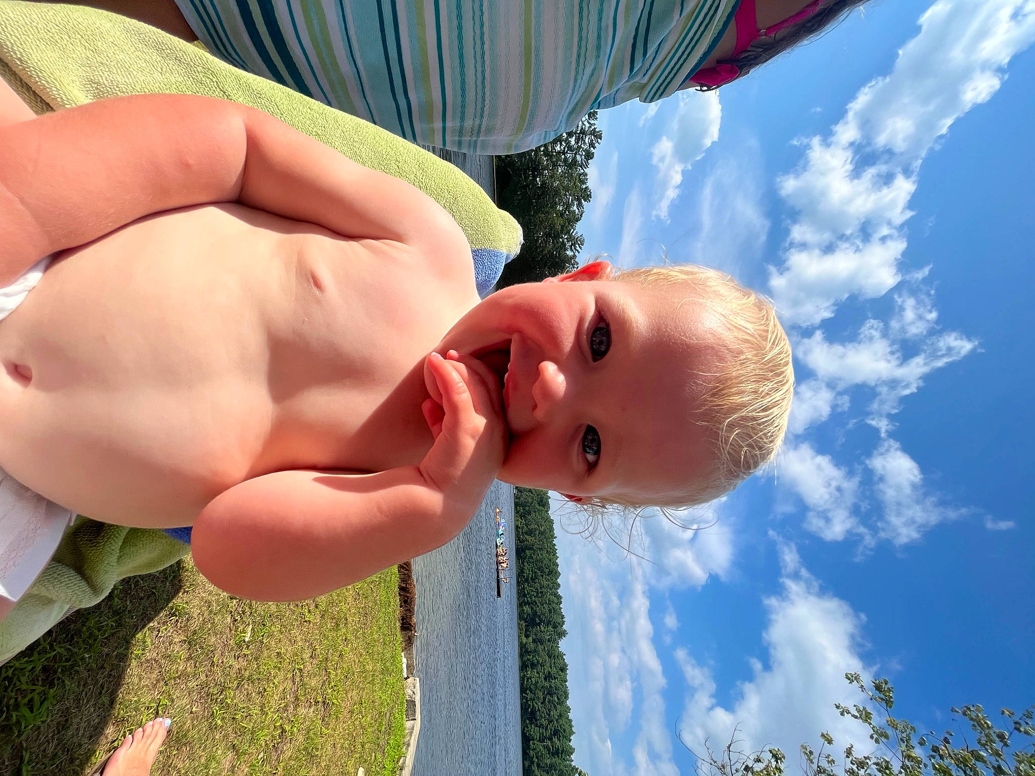 Benjamin joined the competition — help win amazing prizes! azure, baby, barechested, blue, chest, cloud, finger, fun, gesture, grass, happy, leisure, nose, people_in_nature, person, skin, sky, smile, thumb, toddler