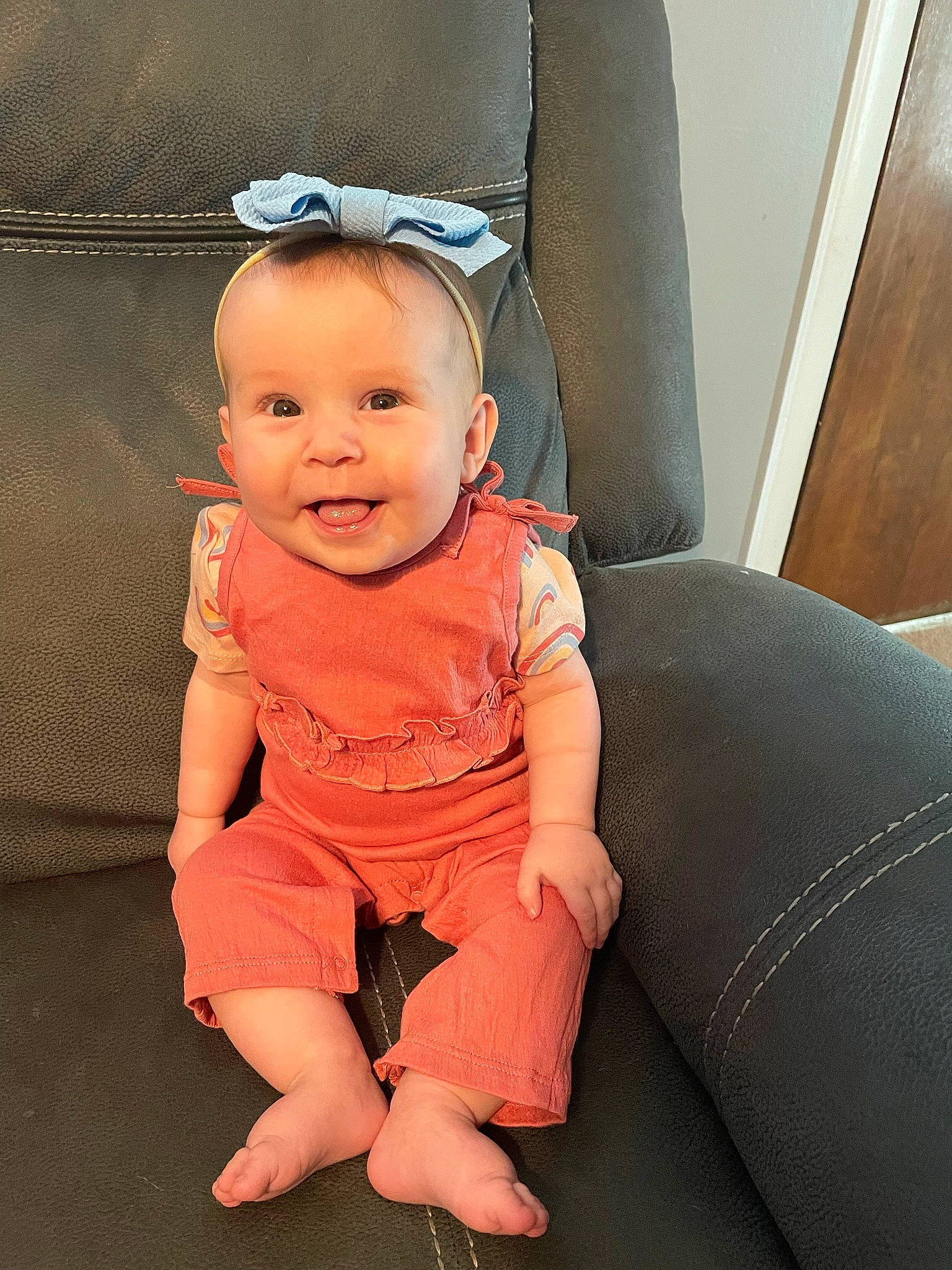 Eliza joined the competition — help win amazing prizes! auto_part, baby, baby_toddler_clothing, child, comfort, door, finger, flash_photography, flooring, foot, fun, happy, human_leg, person, sitting, skin, smile, t_shirt, thigh, thumb