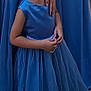 Emy participe au concours pour gagner de l'argent avec cette photo : child, girl, blue_dress, dress, pearl, hair_bun, bow, smile, portrait, person, family, formal_wear, outdoor, hand, arm, happy, childhood, fashion, elegant, event