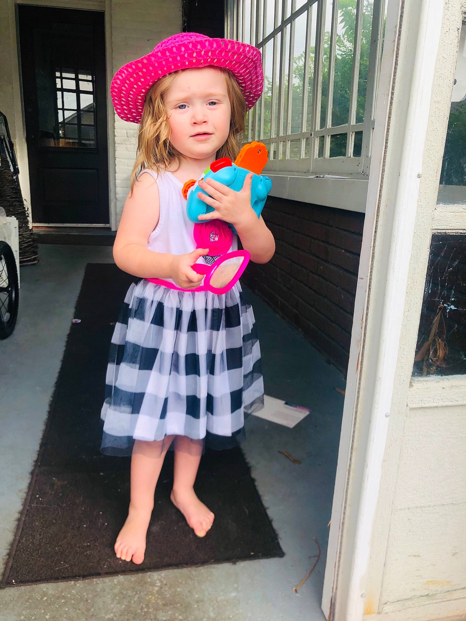 Izzy joined the competition — help win amazing prizes! automotive_lighting, baby_toddler_clothing, cap, dress, electric_blue, fashion, hat, headwear, human_leg, magenta, pattern, person, pink, plaid, street_fashion, t_shirt, tartan, tire, toddler, vehicle_door