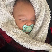 Jasper joined the competition — help win amazing prizes! baby, sleeping, pacifier, blanket, cozy, wrapped, infant, closeup, face, child, soft, warm, comfort, indoor, resting, cute, peaceful, young, portrait, head