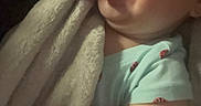 Sunflower joined the competition — help win amazing prizes! baby, infant, tongue, smile, blanket, cozy, cute, child, wrapped, happy, playful, face, skin, arm, clothing, soft, warm, indoors, portrait, expression